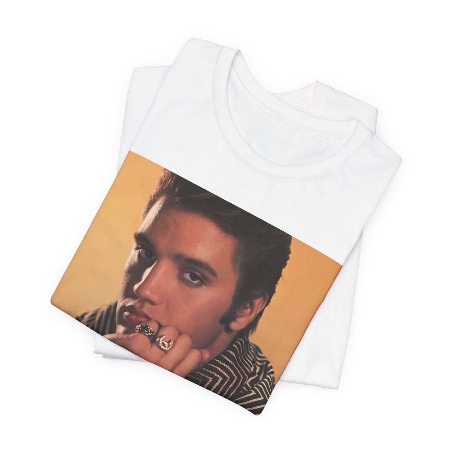 A black graphic t-shirt featuring an aesthetic photo portrait of Elvis Presley.