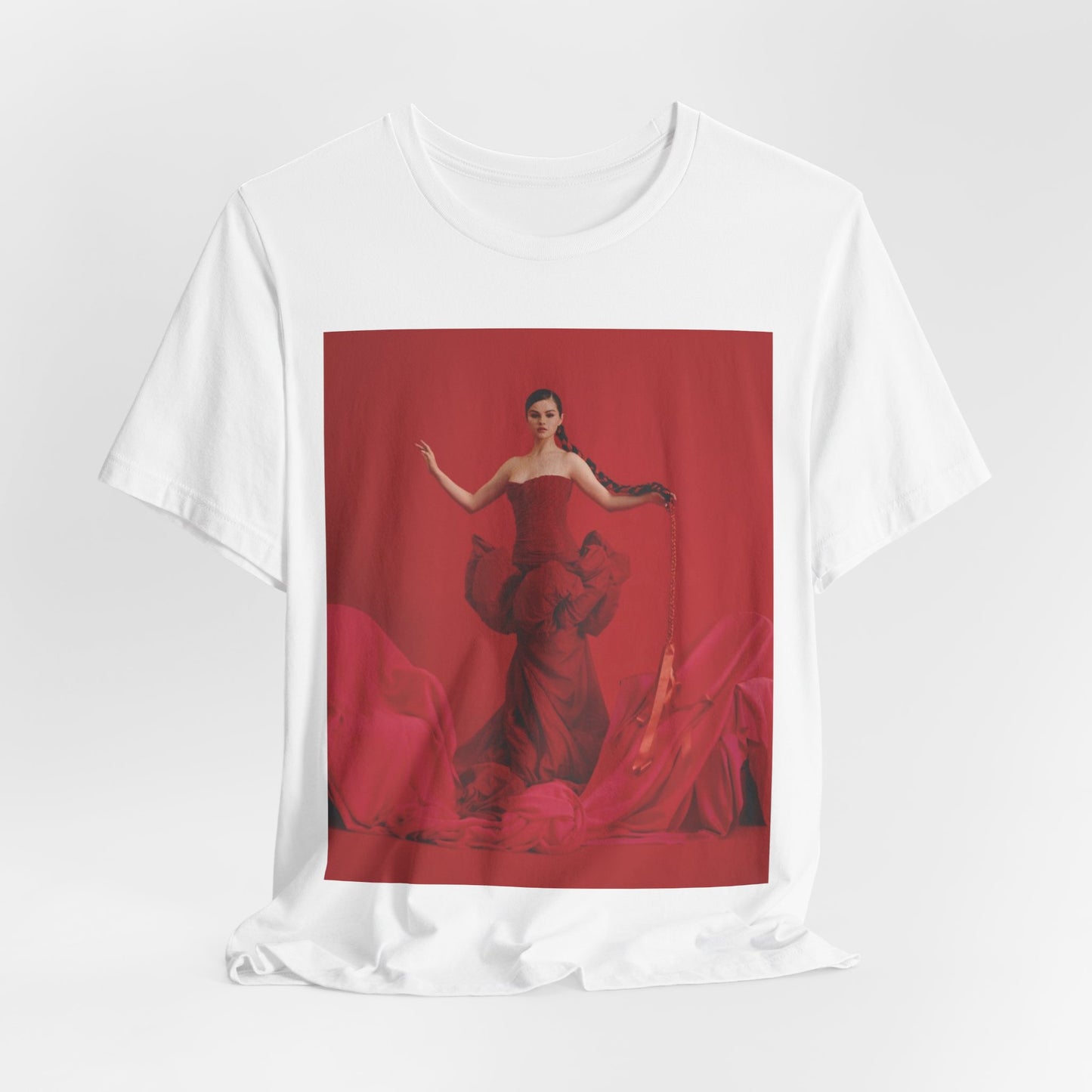 A black graphic t-shirt featuring a glam pop diva graphic of Selena Gomez.