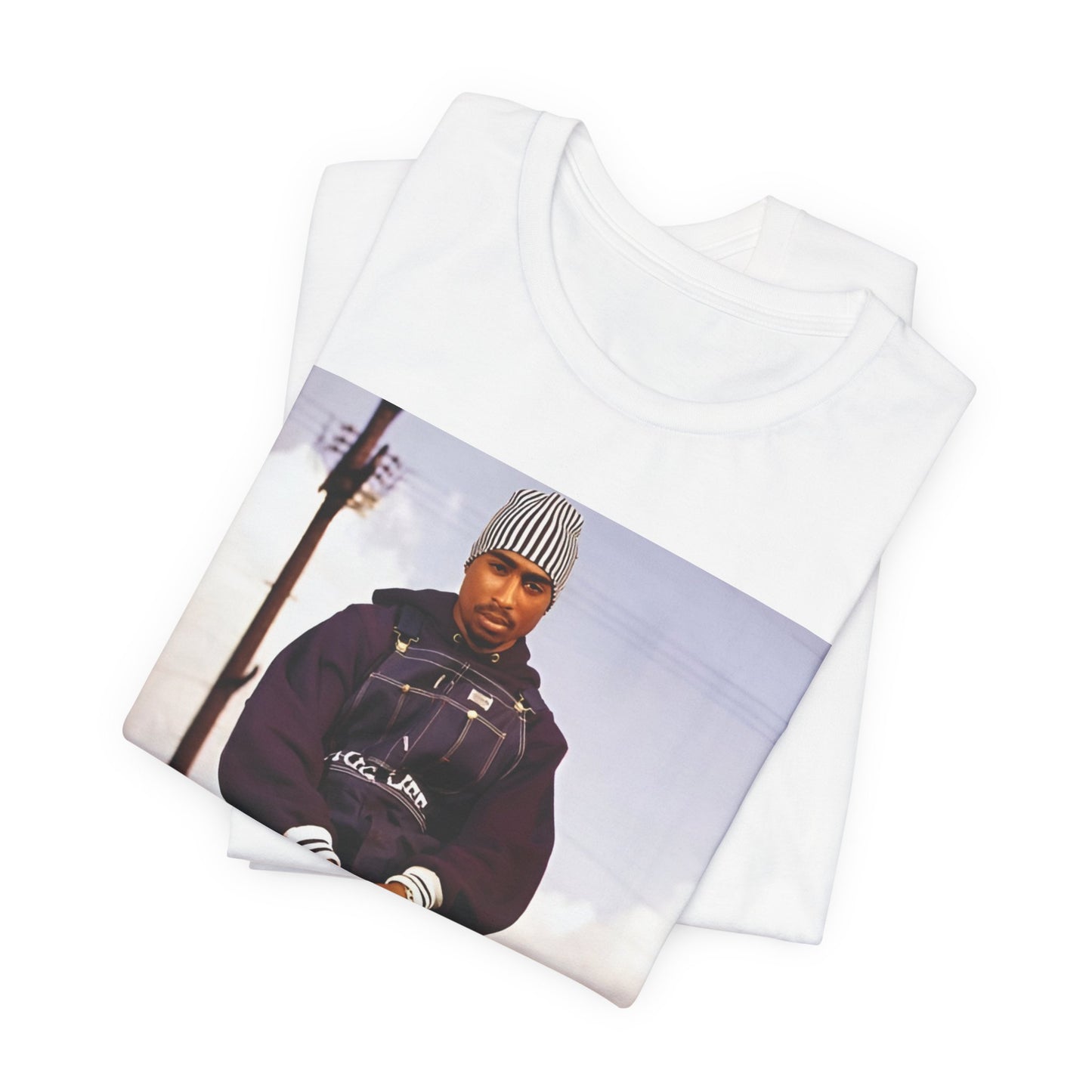 A black graphic t-shirt featuring a timeless rap legend graphic of Tupac.