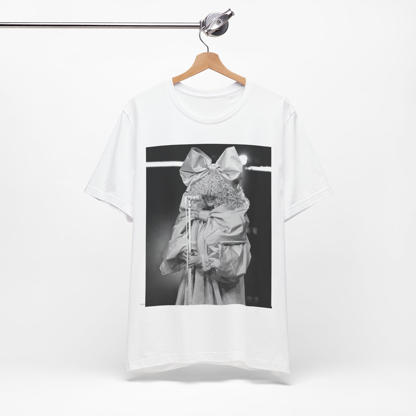 A black graphic t-shirt featuring a black and white, monochrome graphic or photo of Sia.
