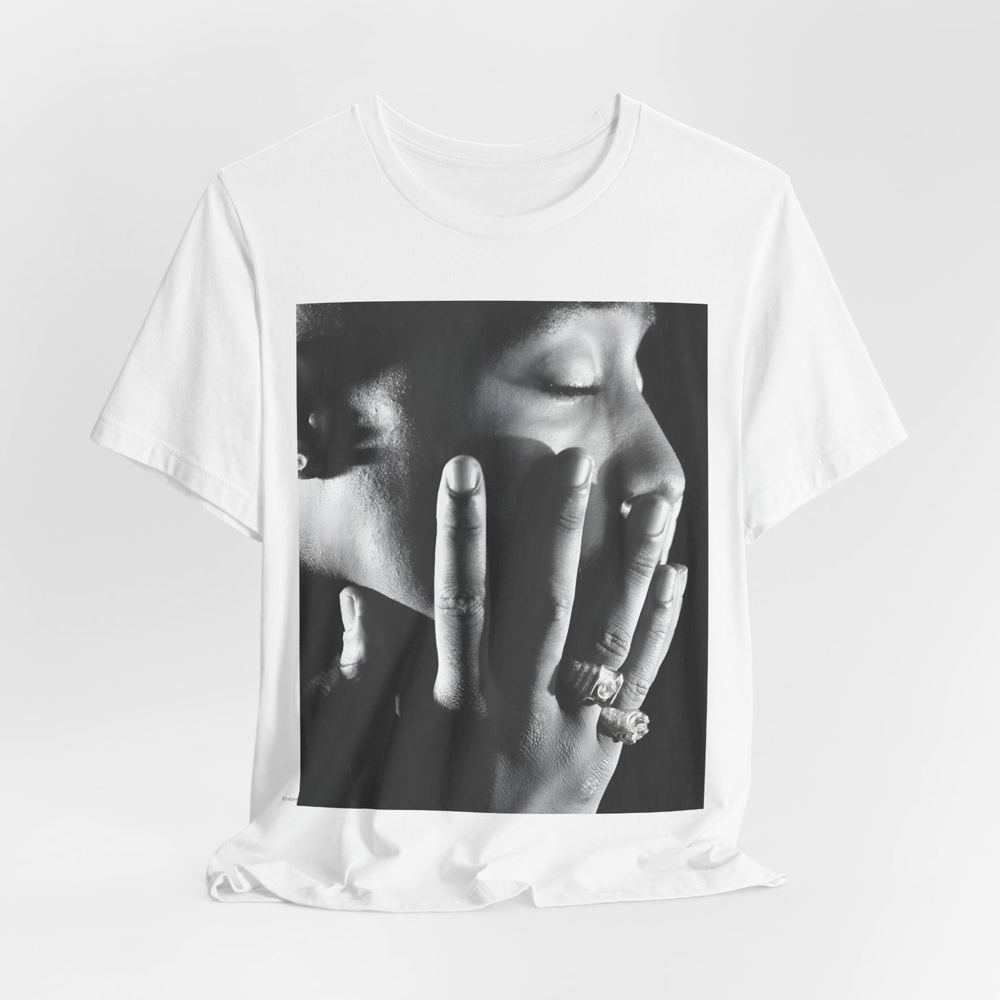 A black graphic t-shirt featuring an iconic West Coast swag graphic of Tupac.