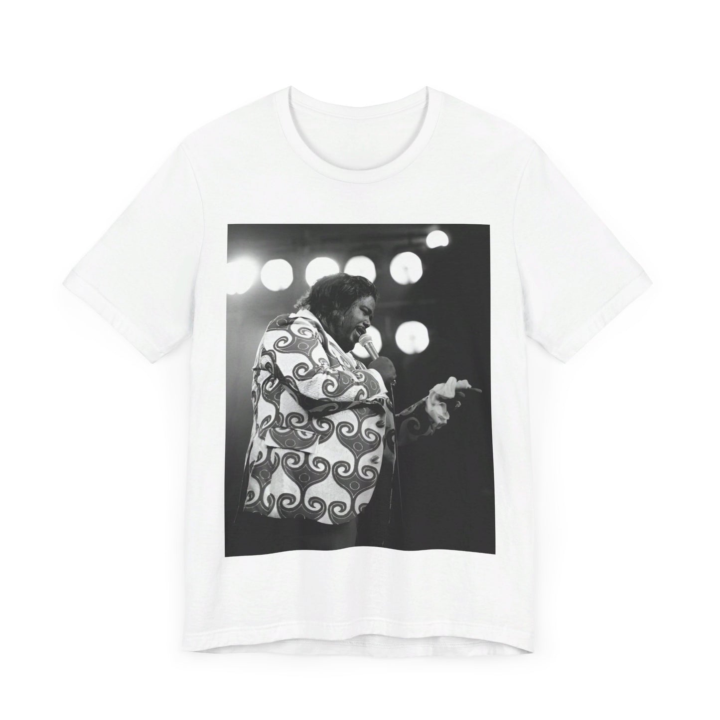A black graphic t-shirt featuring a graphic or photo of Barry White performing live on stage in the 1970s.