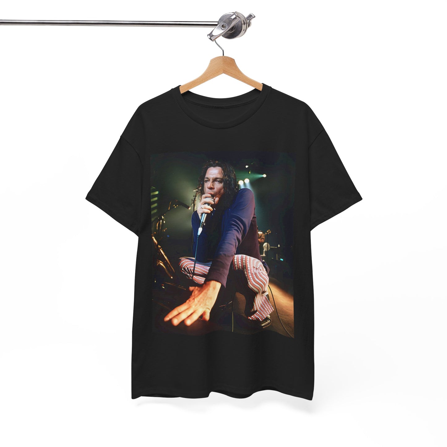 A black graphic t-shirt featuring a graphic related to INXS's 'Elegantly Wasted' album era.