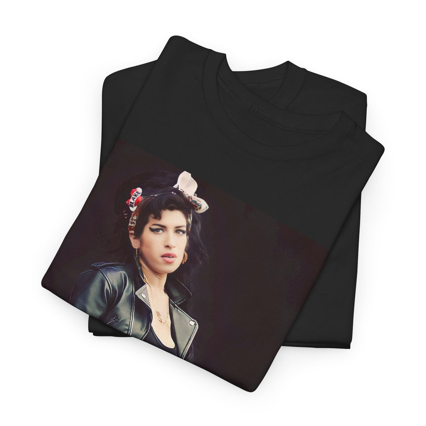 A black graphic t-shirt featuring a photo or illustration of Amy Winehouse on stage, with leather elements and a prominent red background or lighting.