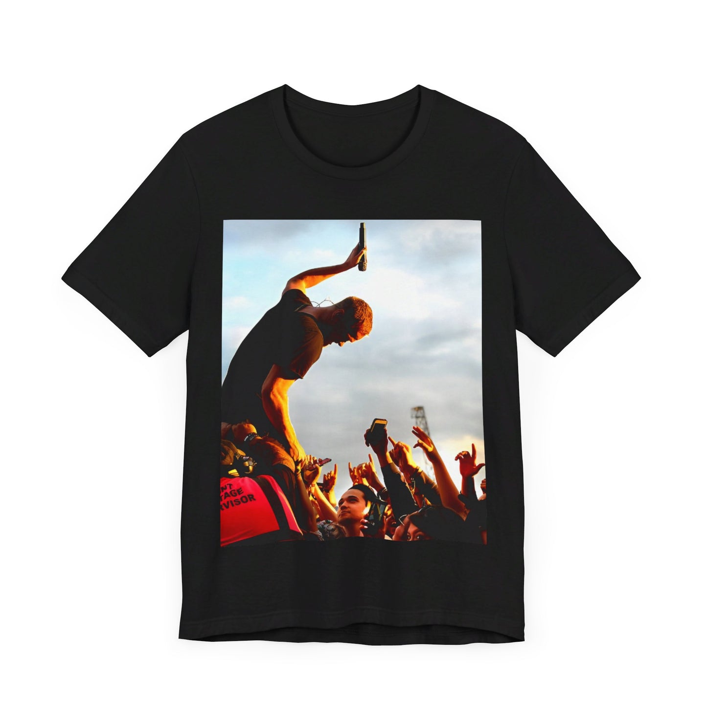 A black graphic t-shirt featuring a graphic of Dan Reynolds from Imagine Dragons performing live.