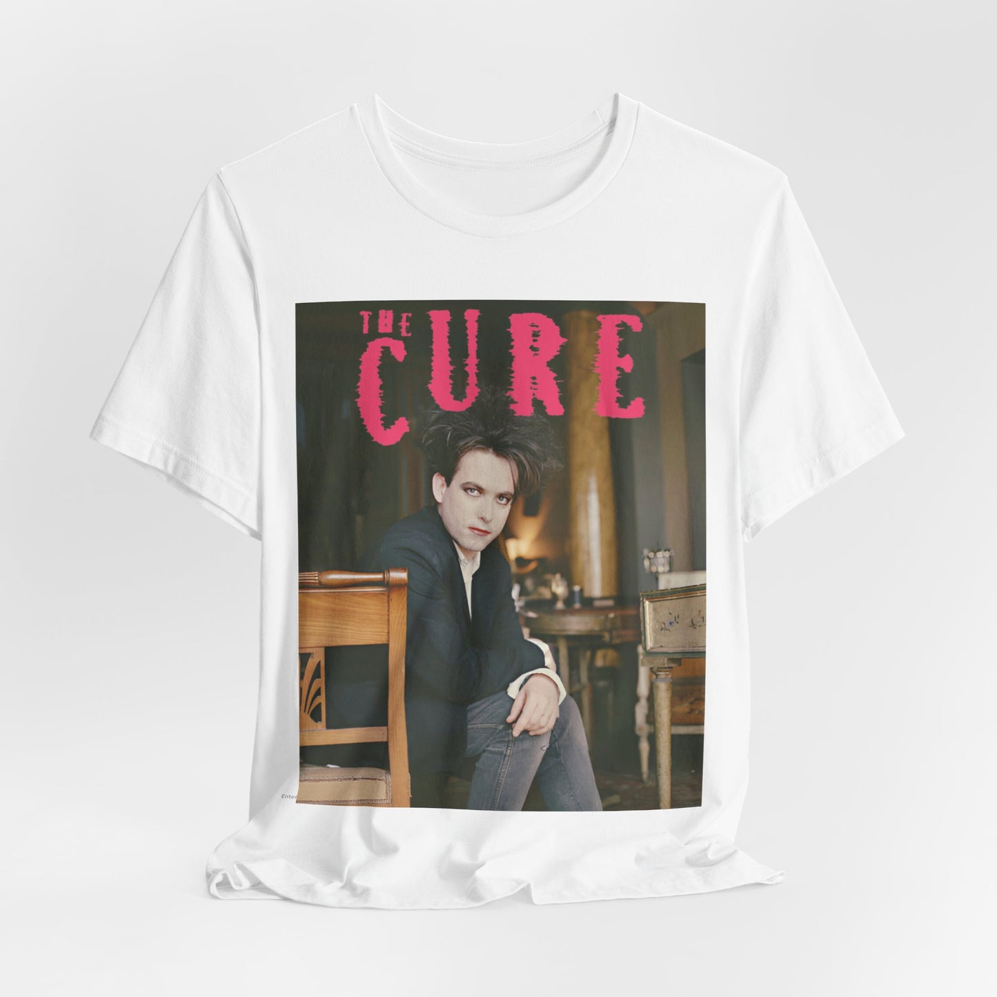 A black graphic t-shirt featuring a retro graphic related to The Cure's 'Disintegration' album era.