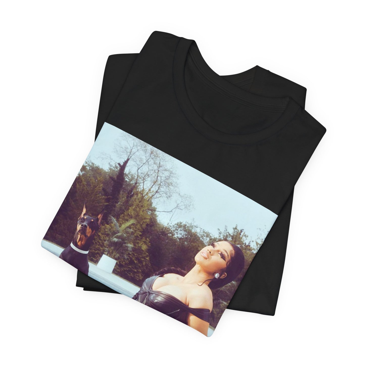 A black graphic t-shirt featuring a graphic related to Cardi B's 'I Like It' song, with bold pop culture elements.