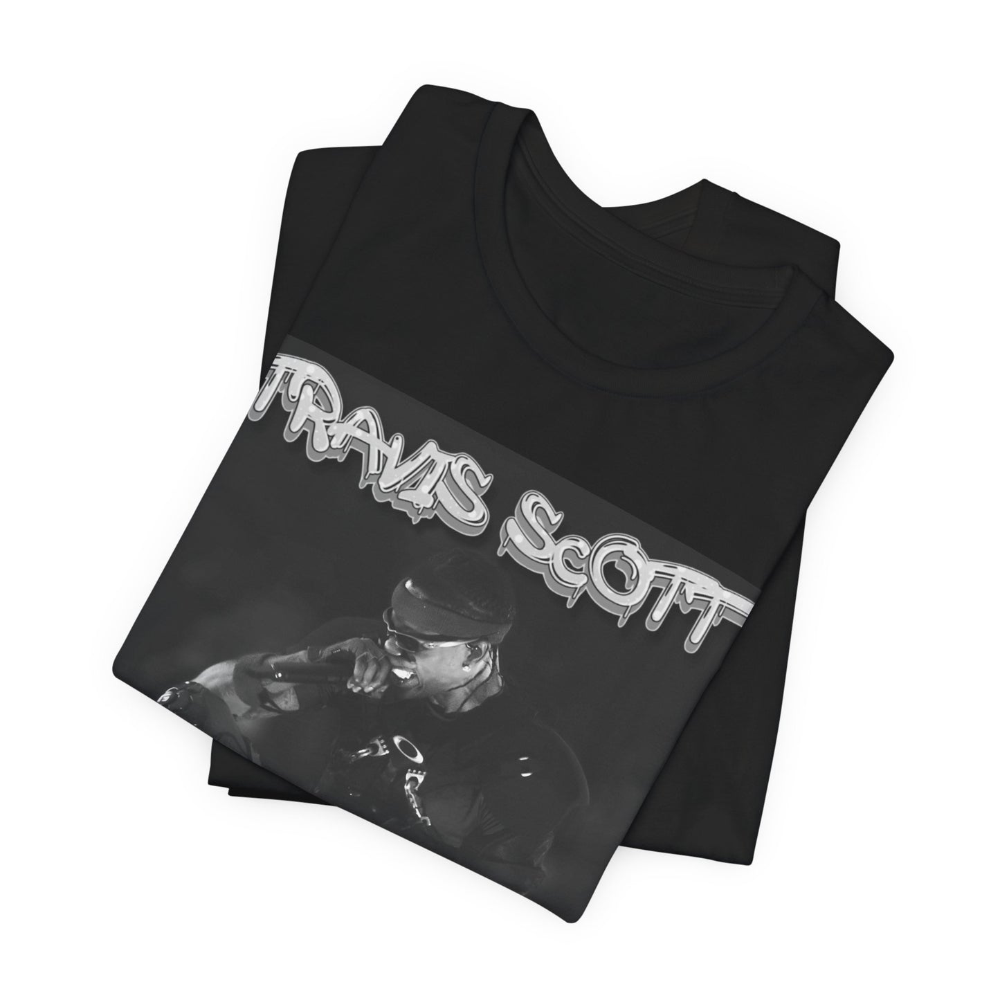 A black graphic t-shirt featuring a casual rap fan graphic of Travis Scott.