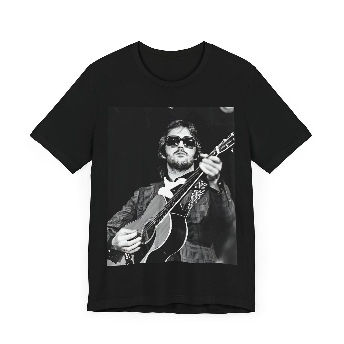 A black graphic t-shirt featuring a graphic of Eric Clapton with a chill blues rock vibe.