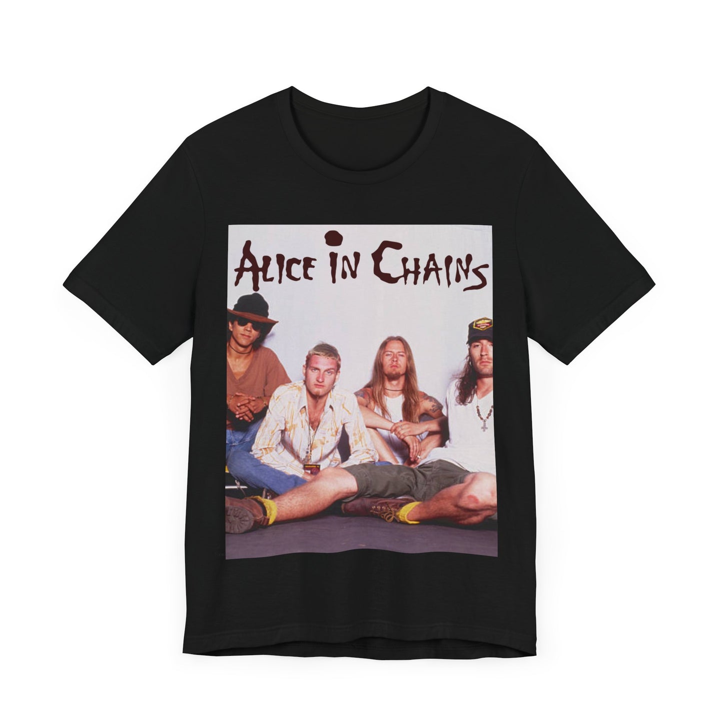 A black graphic t-shirt featuring a classic rock graphic of Alice In Chains from the 1990s, possibly with band members or stylized logo.