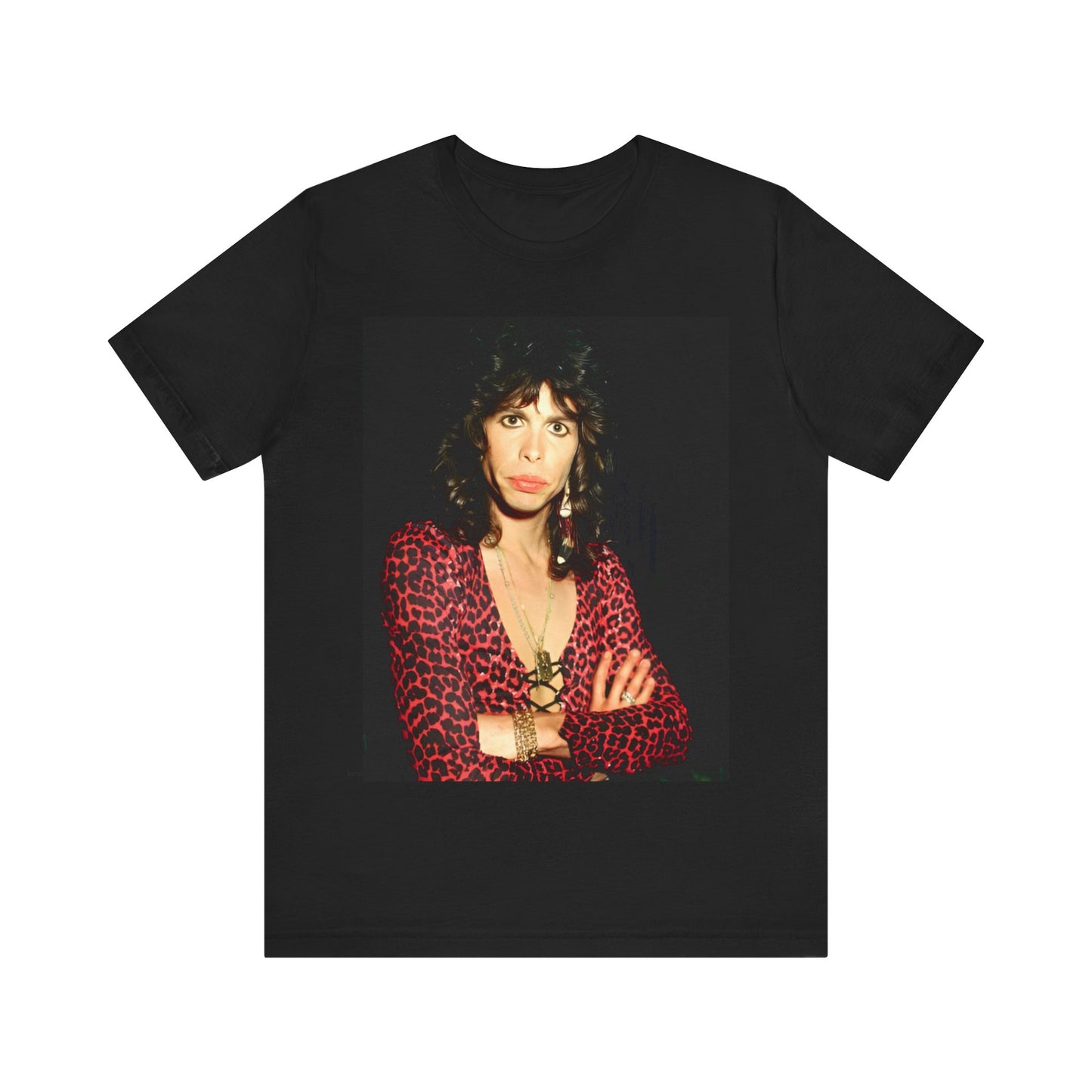A black graphic t-shirt featuring a vintage 70s-inspired design with Aerosmith branding, incorporating a prominent leopard print pattern.