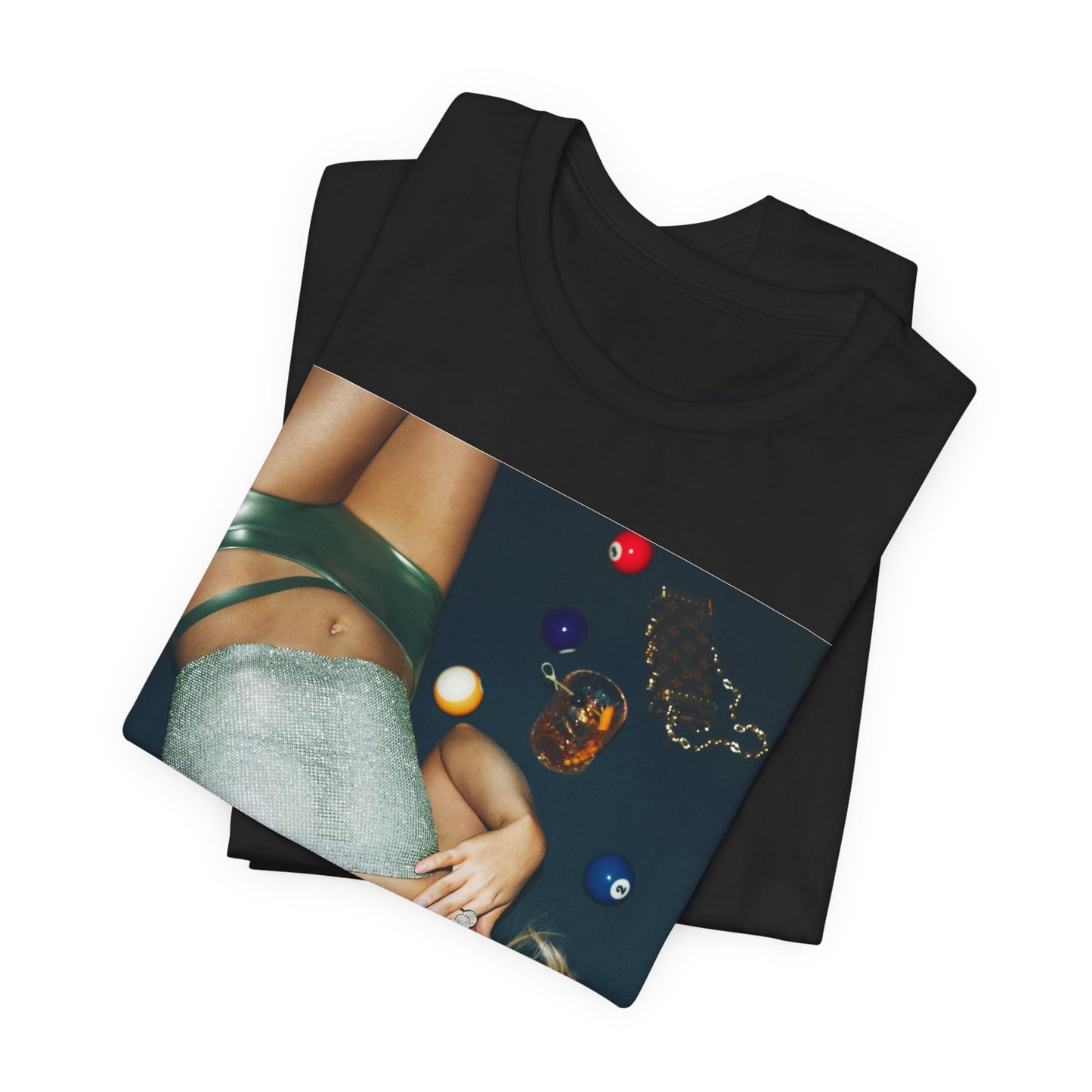 A black graphic t-shirt featuring a vintage pop icon graphic of Sabrina Carpenter.