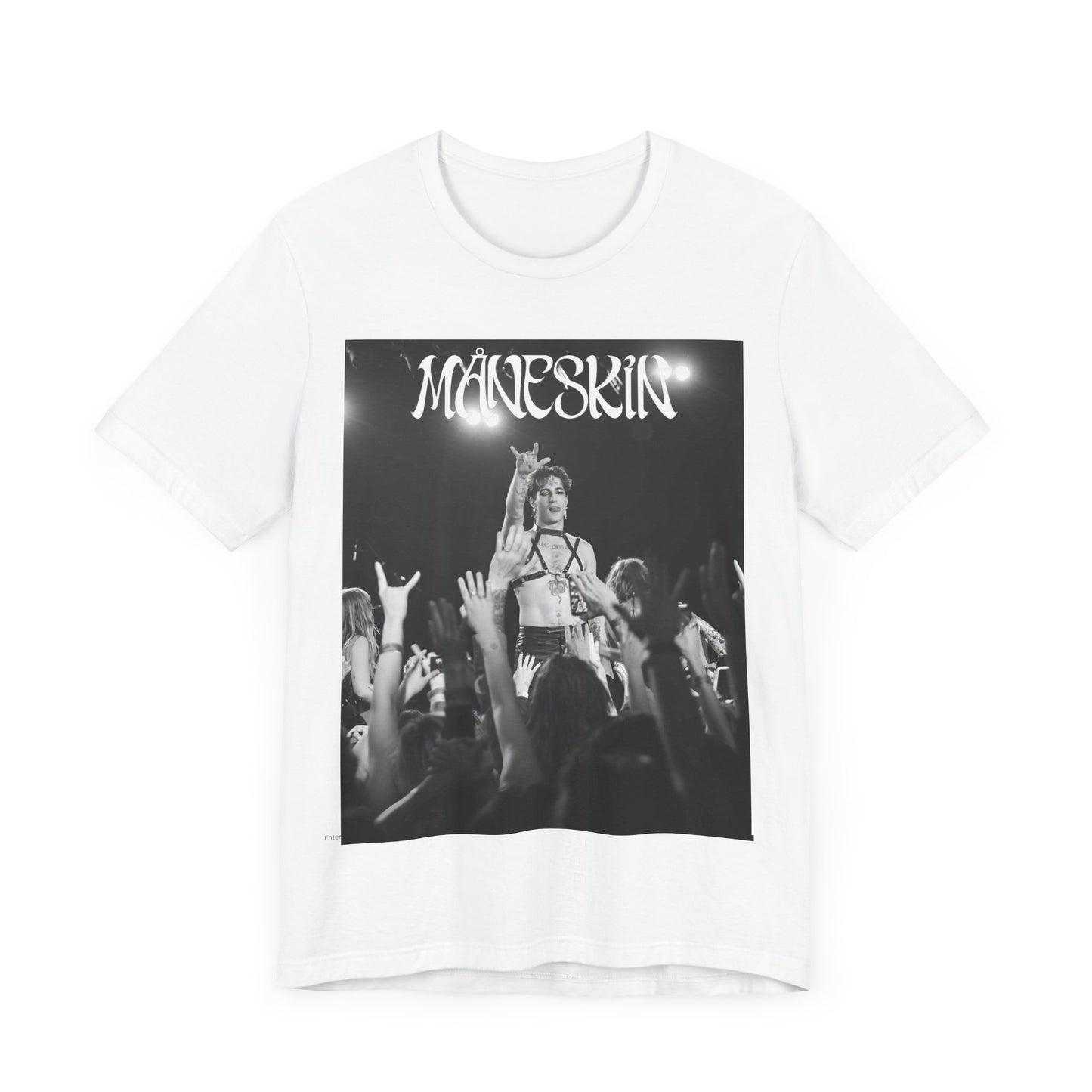 A black graphic t-shirt featuring a graphic or photo of Maneskin performing live.