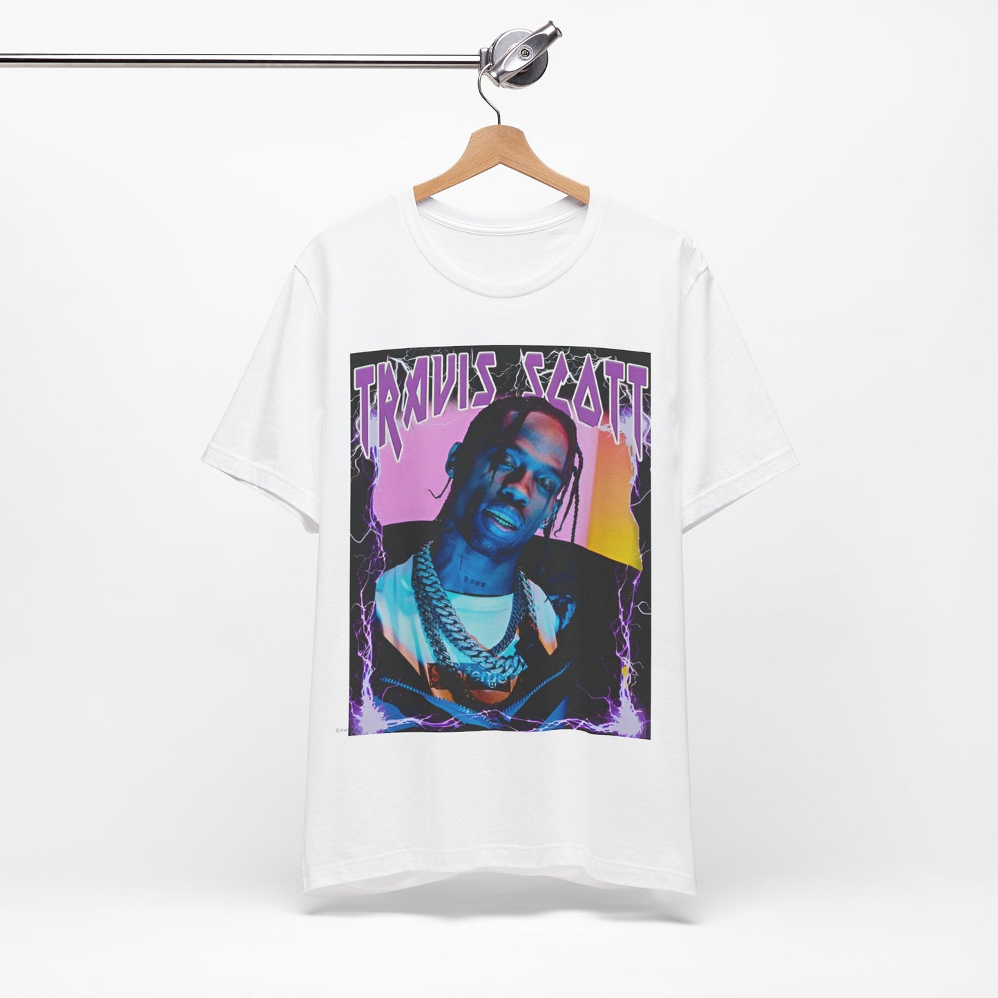 A black graphic t-shirt featuring a retro bootleg graphic of Travis Scott.