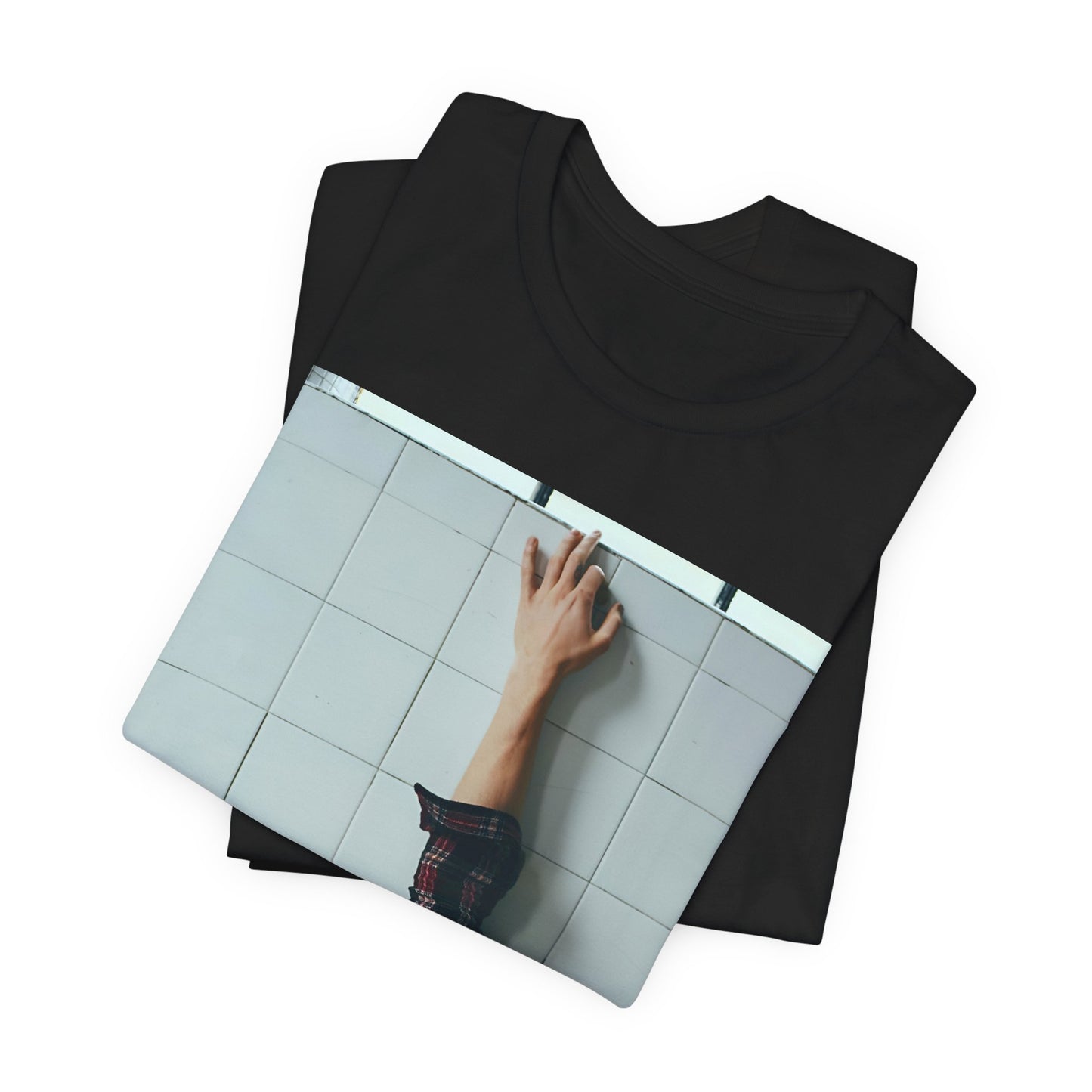 A black graphic t-shirt featuring a bold graphic of Shawn Mendes as a superstar.