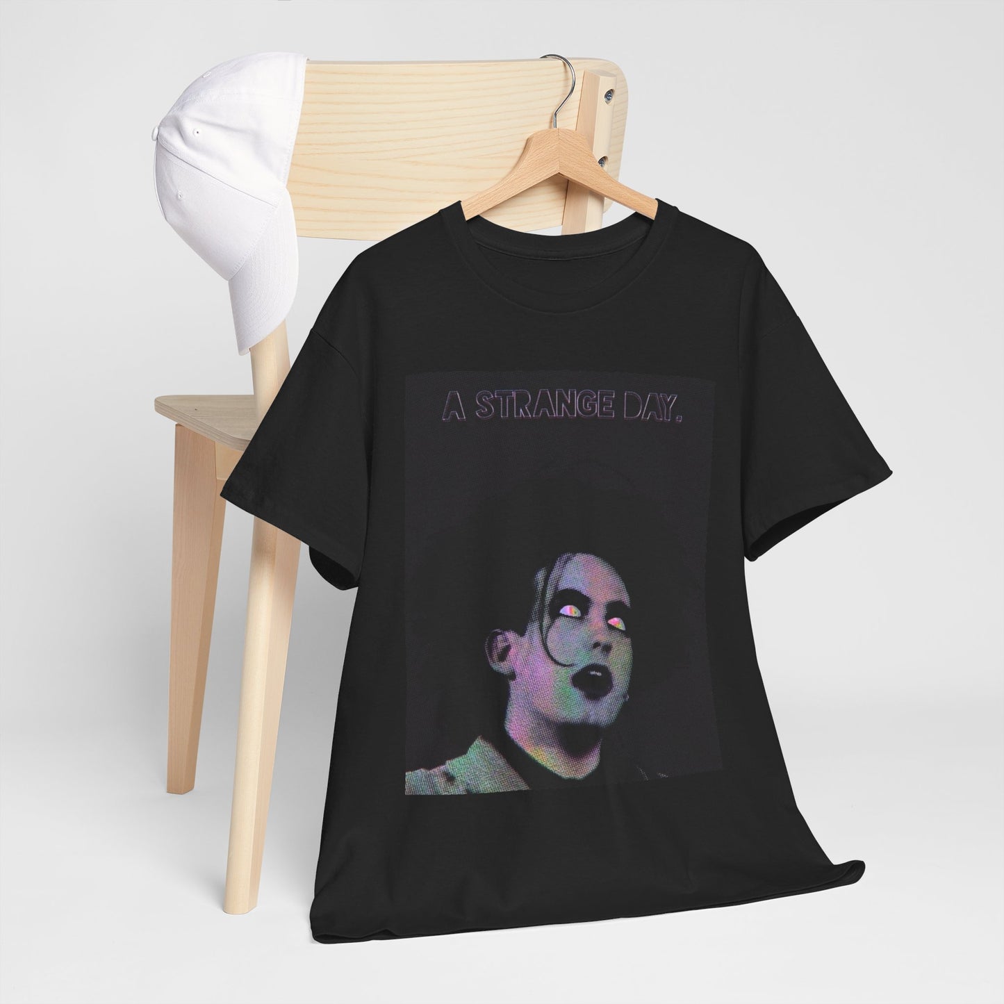 A black graphic t-shirt featuring an aesthetic graphic of The Cure.