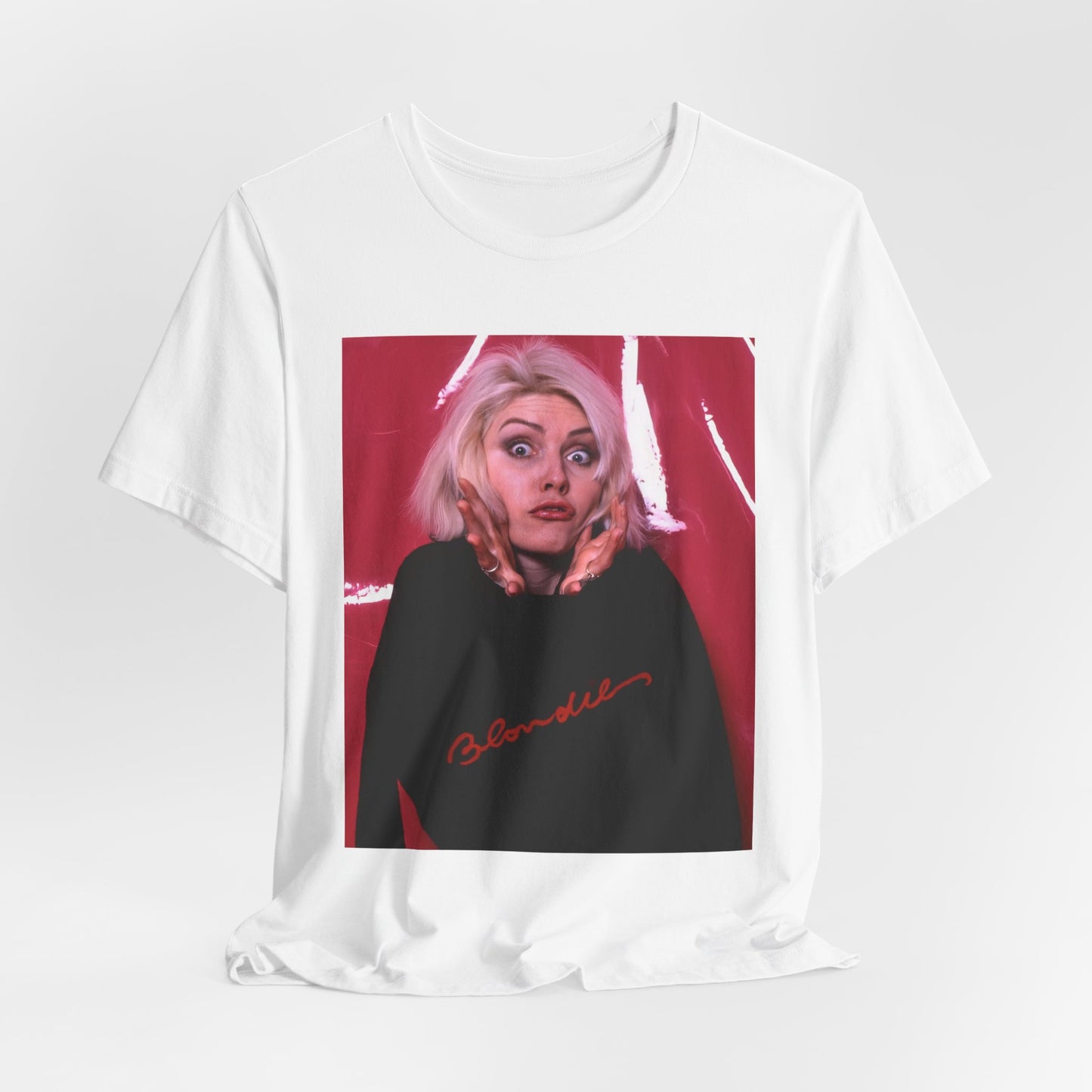 A black graphic t-shirt featuring a graphic related to Blondie's 'Atomic' song or era.