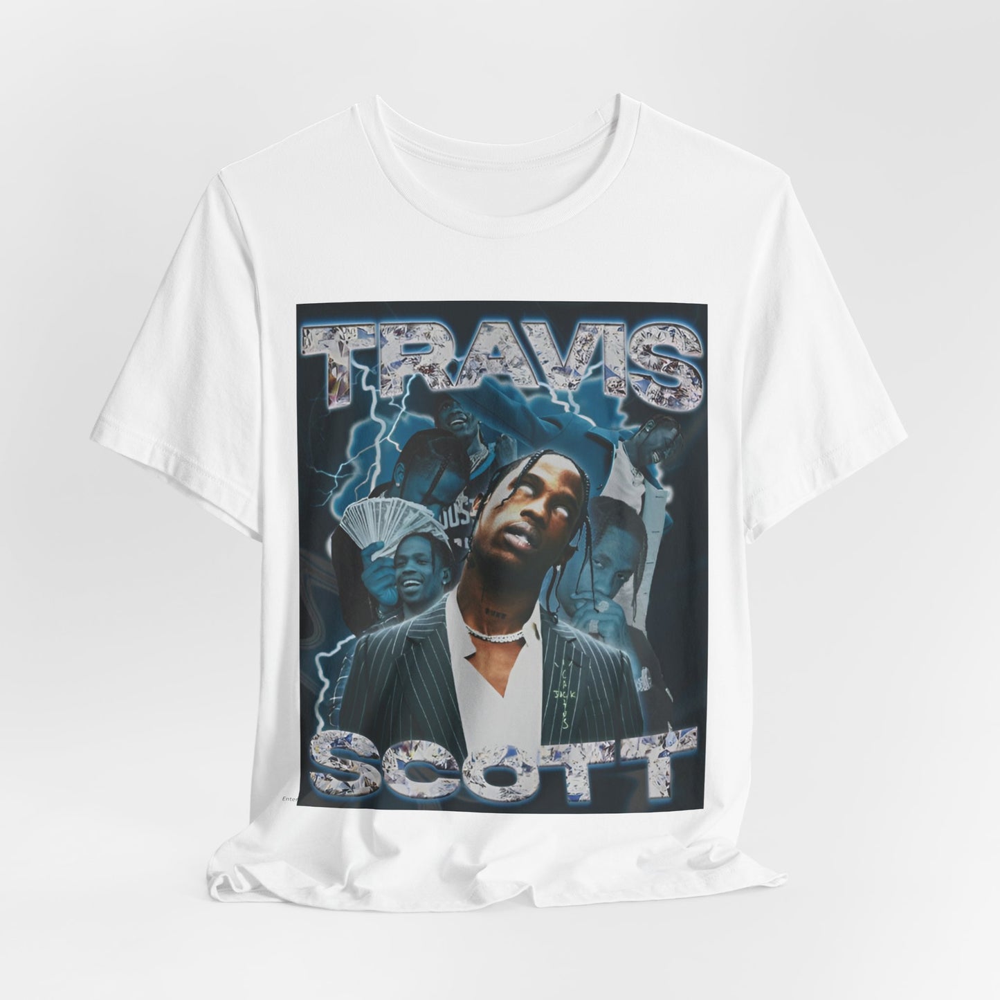 A black graphic t-shirt featuring a 90s bootleg style graphic of Travis Scott.