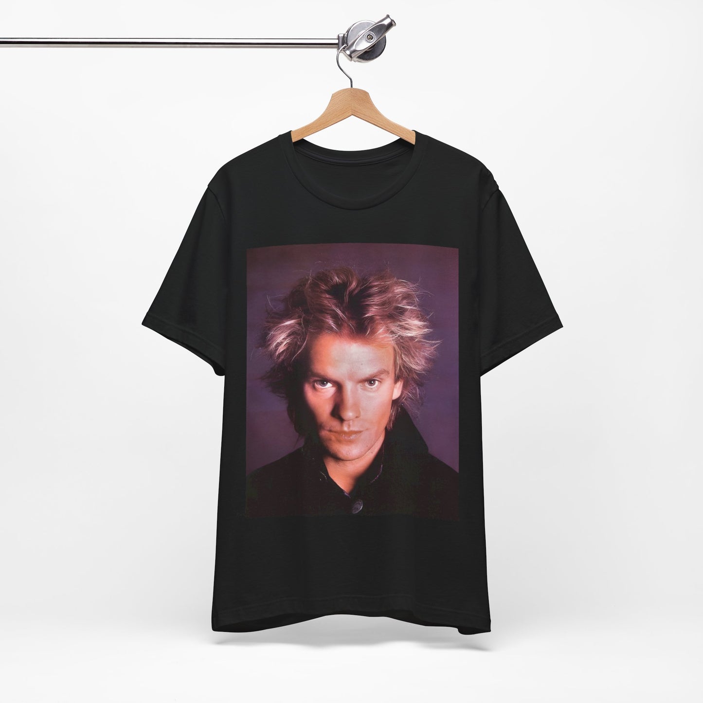 A black graphic t-shirt featuring a graphic related to Sting's 'Every Breath You Take' song or era.