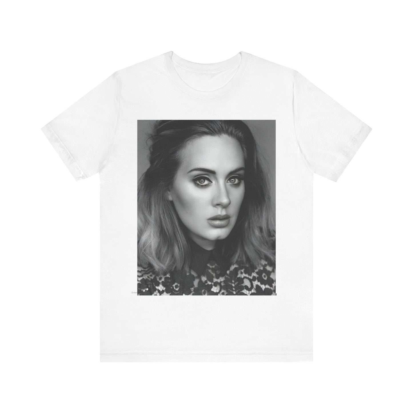 A black graphic t-shirt featuring a classic black and white, monochrome portrait of Adele, showing her with a serene or thoughtful expression.