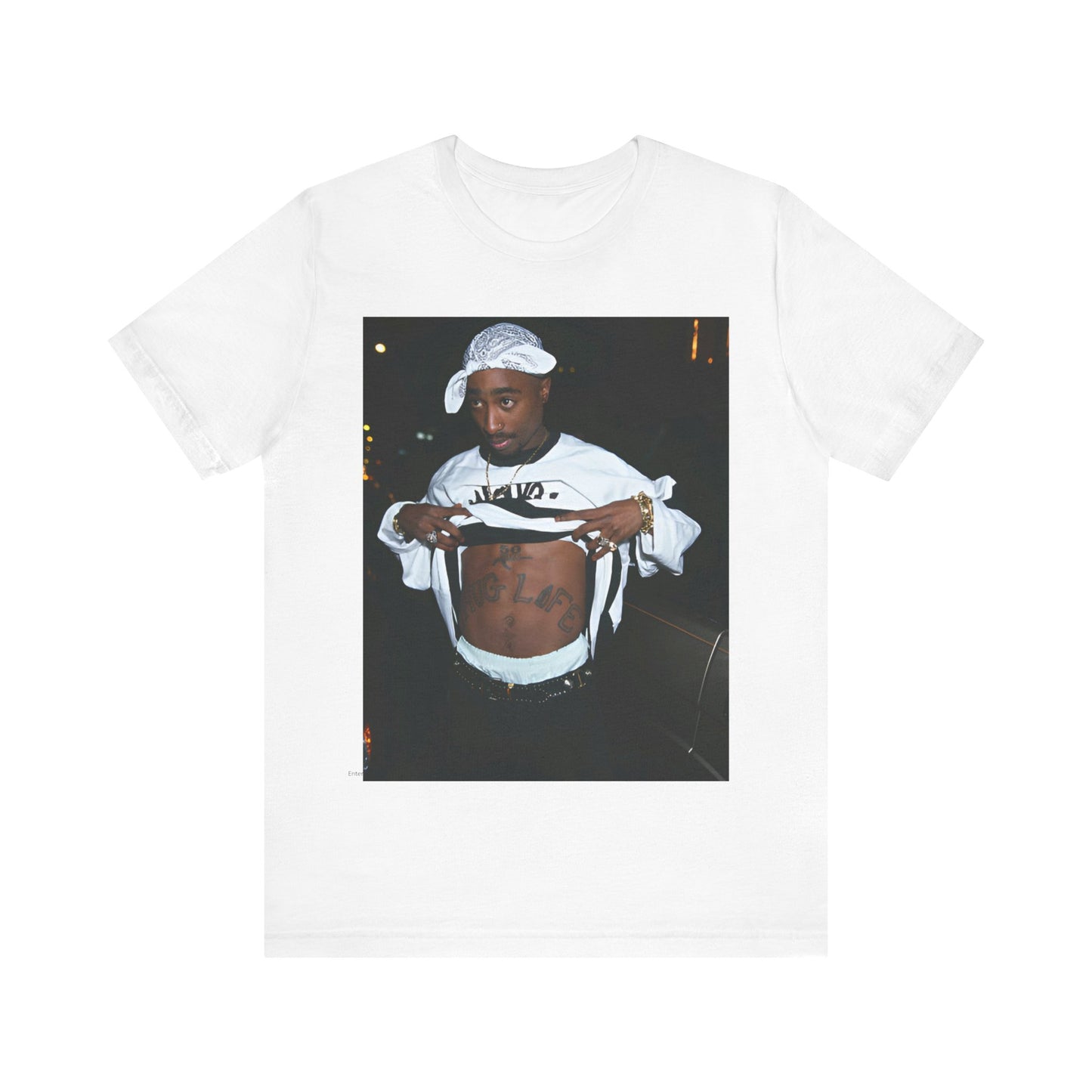 A black graphic t-shirt featuring a graphic of Tupac Shakur (2Pac).