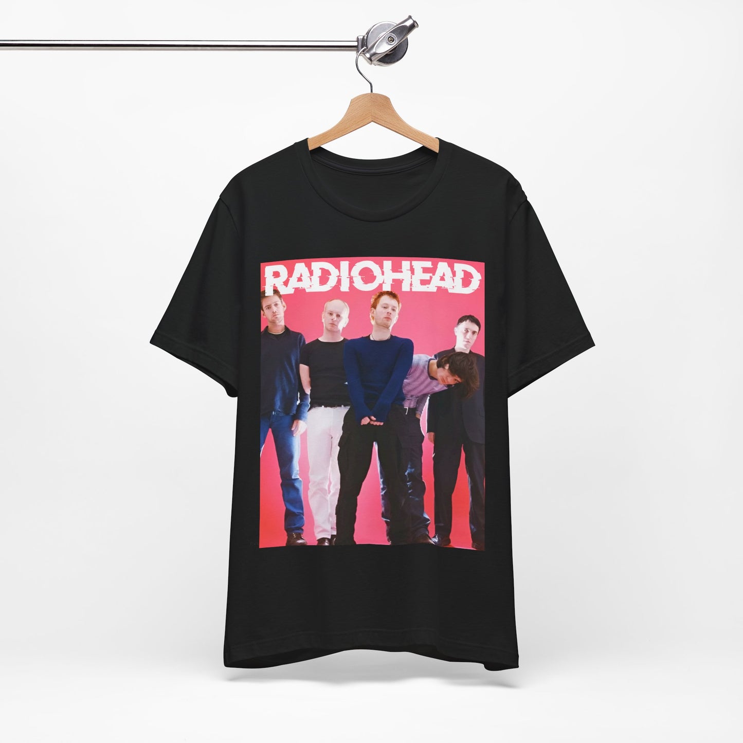 A black graphic t-shirt featuring a 90s alternative aesthetic graphic of Radiohead.