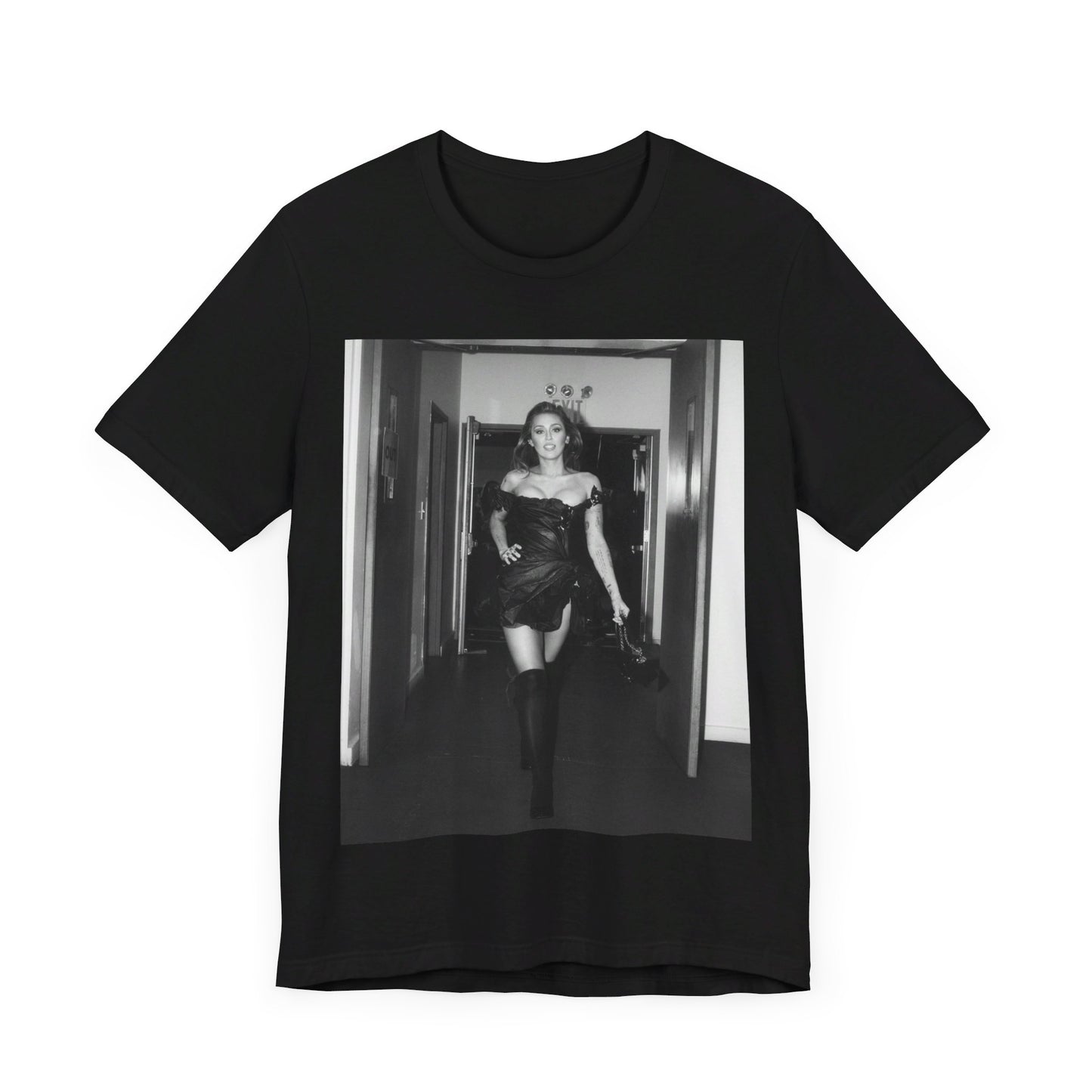 A black graphic t-shirt featuring a black and white graphic of Miley Cyrus in a cool pop rock style.