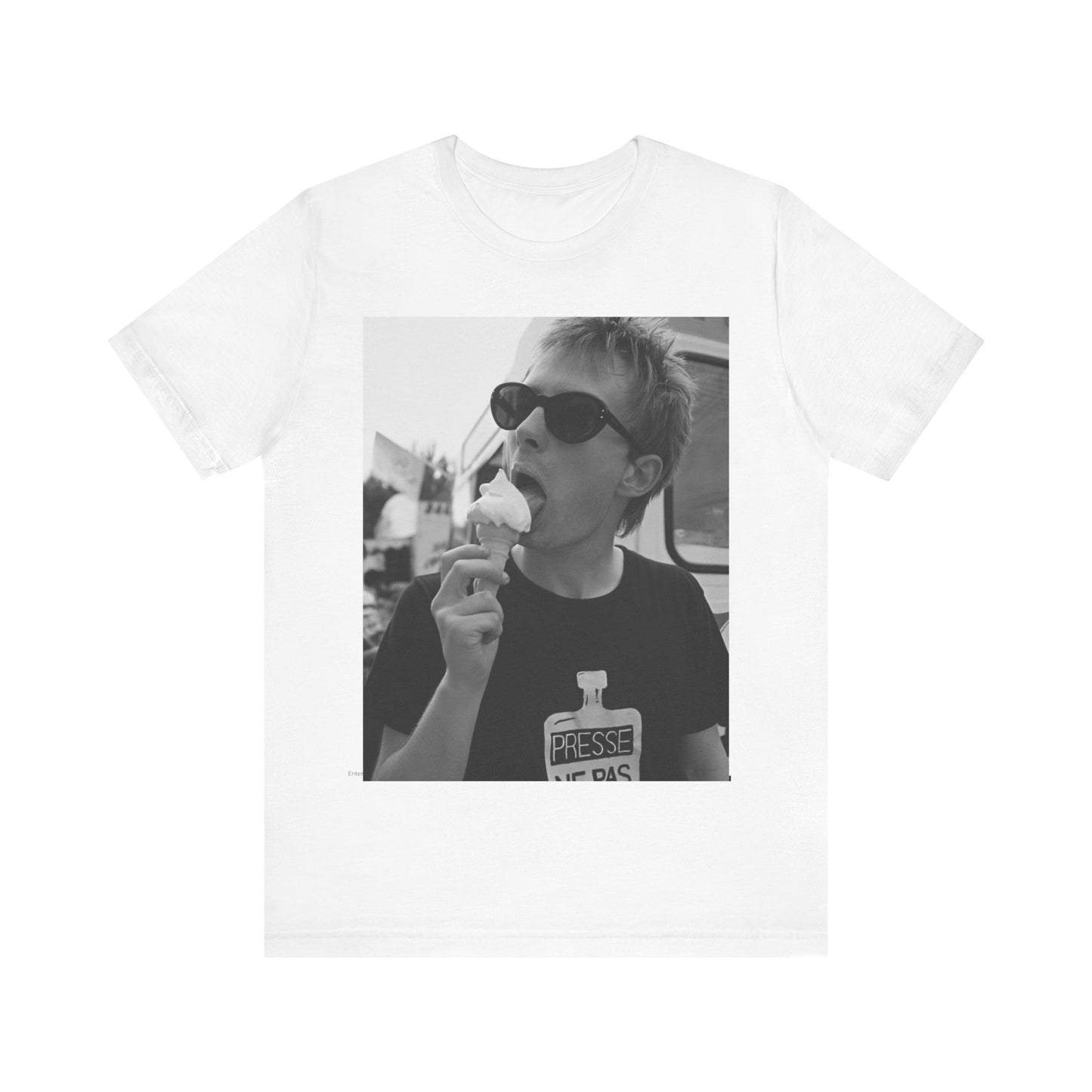 A black graphic t-shirt featuring a graphic of Thom Yorke from Radiohead with an ice cream cone.