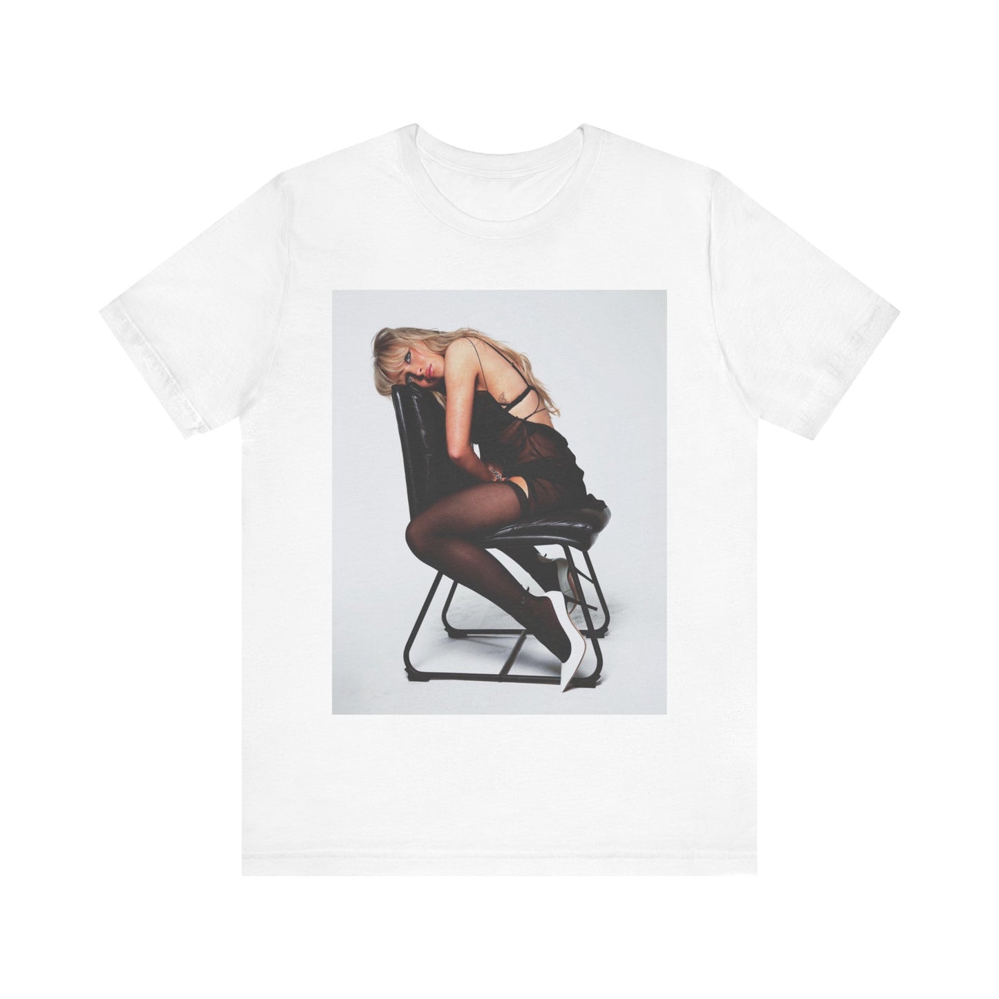 A black graphic t-shirt featuring a playful pop art style graphic of Sabrina Carpenter.