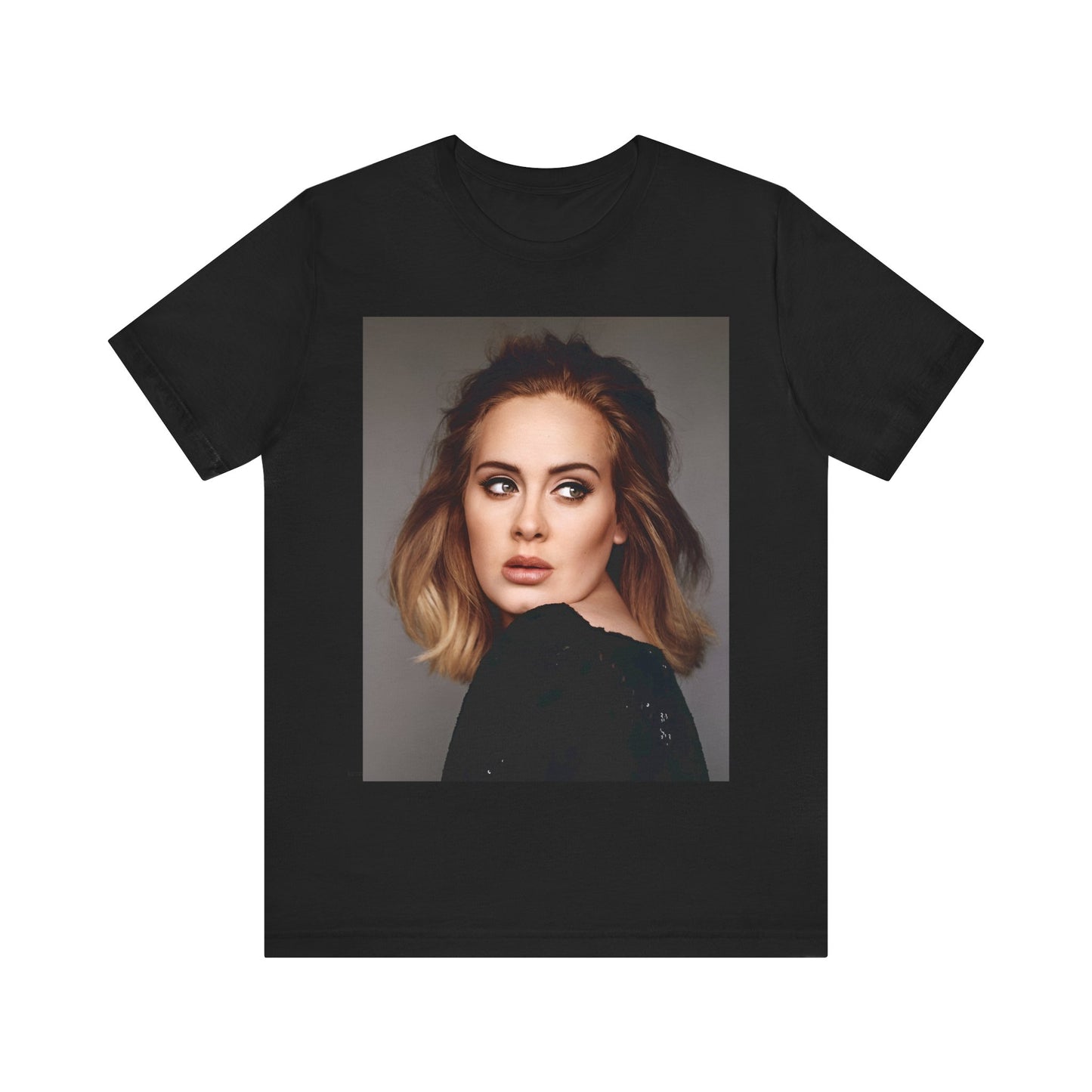 A black graphic t-shirt featuring a studio portrait of Adele from her '25' album era, showing a thoughtful or serene expression.