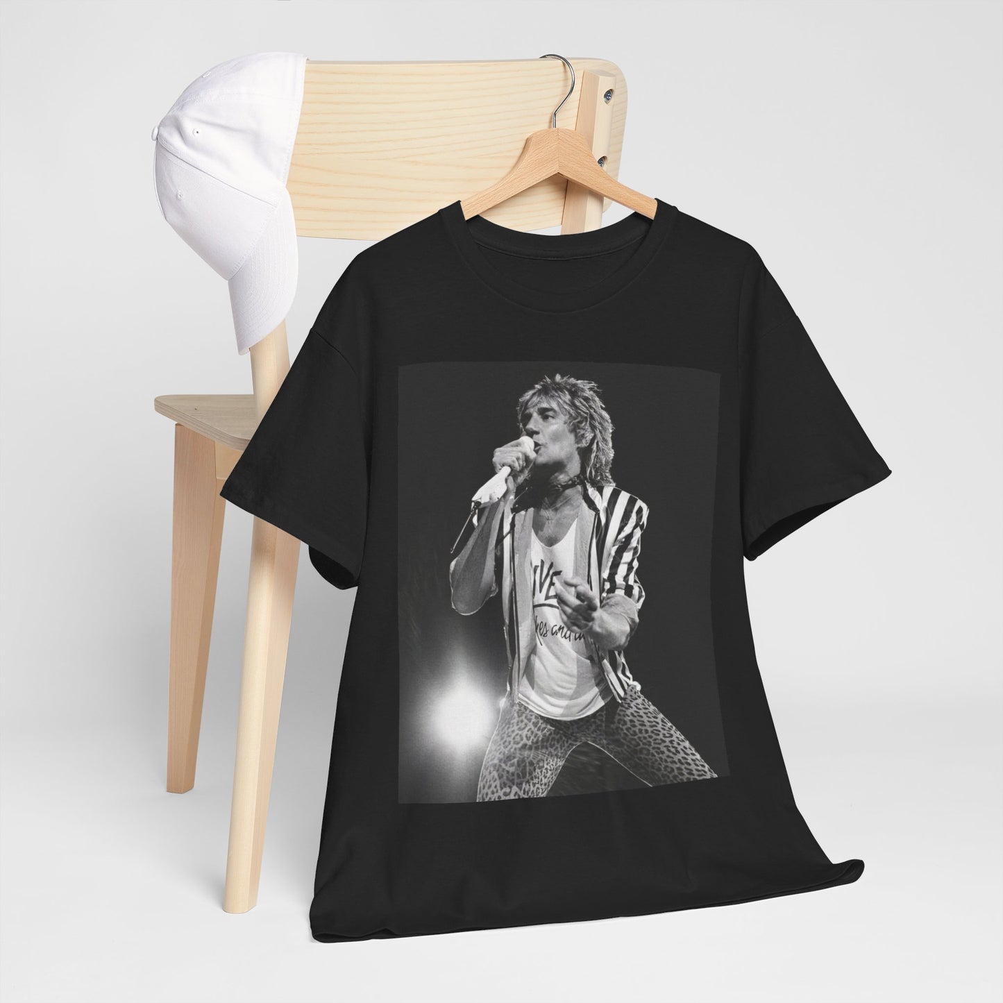 A black graphic t-shirt featuring a vintage graphic or photo of Rod Stewart performing live.