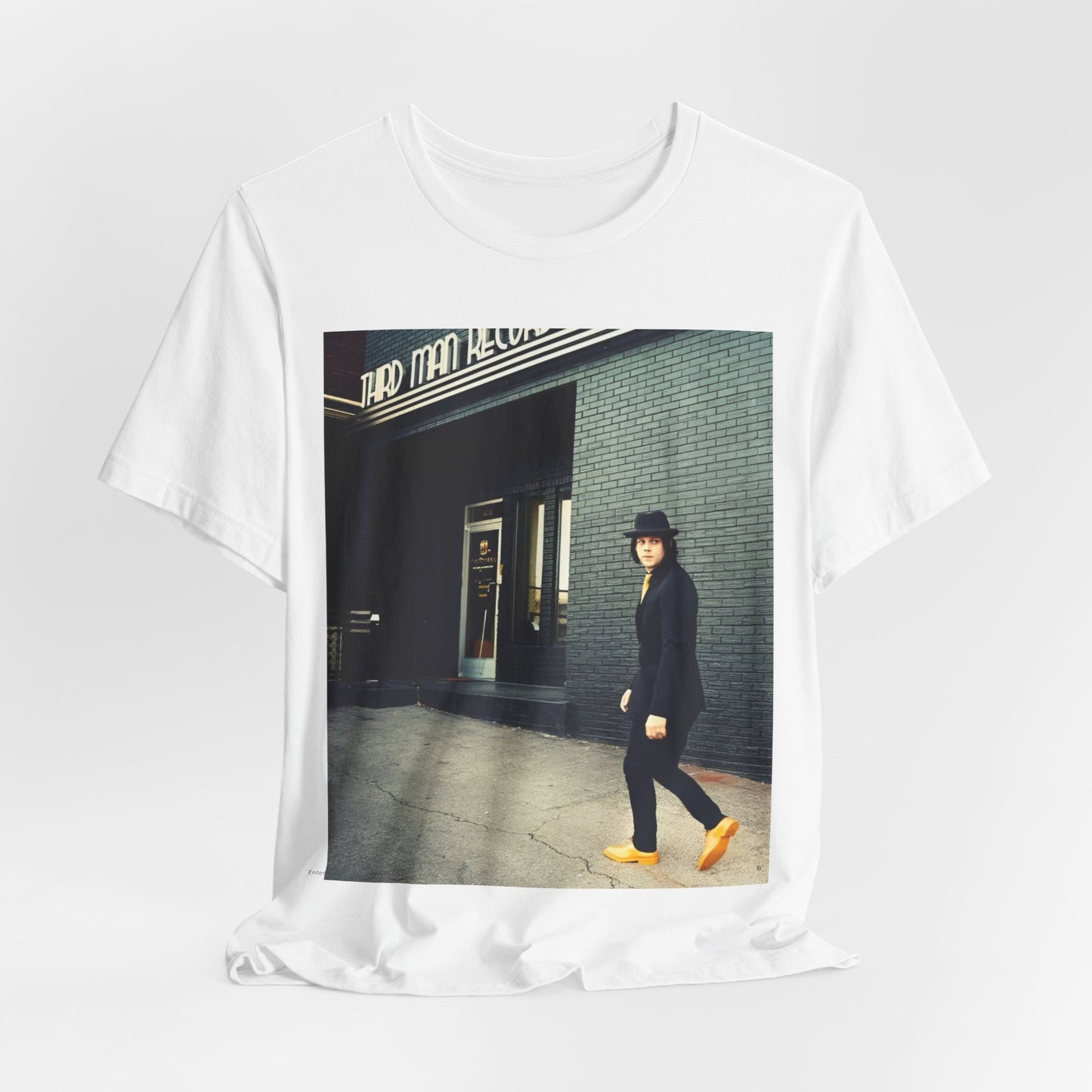 A black graphic t-shirt featuring a garage rock graphic of The White Stripes.