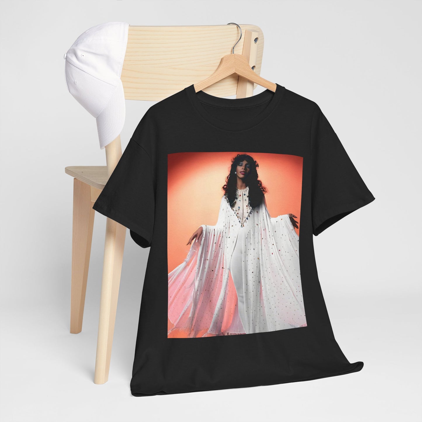 A black graphic t-shirt featuring a classic 70s disco graphic of Donna Summer.