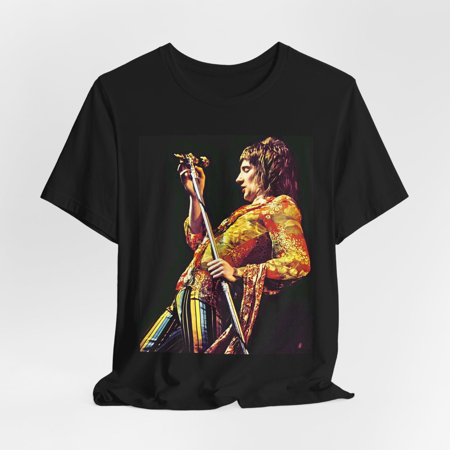 A black graphic t-shirt featuring a fierce graphic of Rod Stewart performing on stage from the 70s.