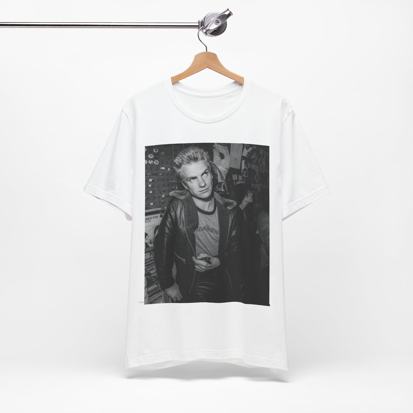 A black graphic t-shirt featuring a vintage black and white monochrome graphic or photo of Sting.