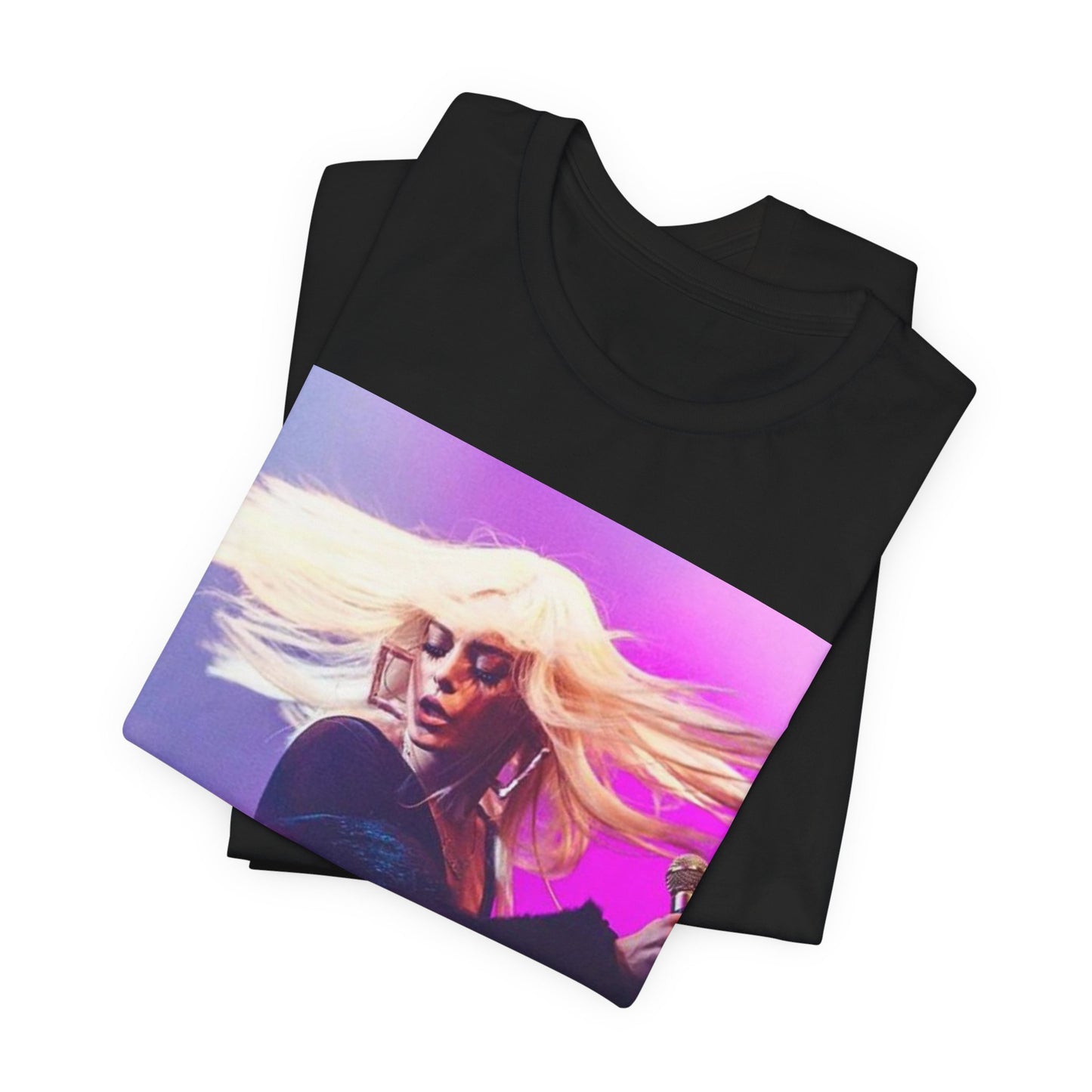 A black graphic t-shirt featuring a dynamic graphic or photo of Bebe Rexha performing live in concert.