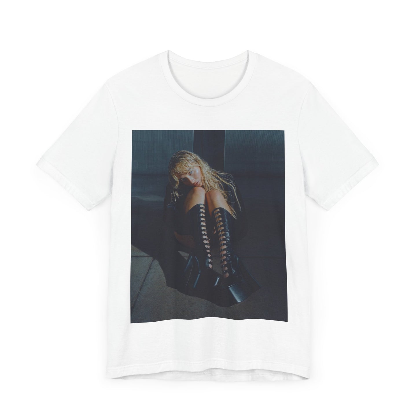 A black graphic t-shirt featuring a bold graphic of Sabrina Carpenter as a pop superstar.