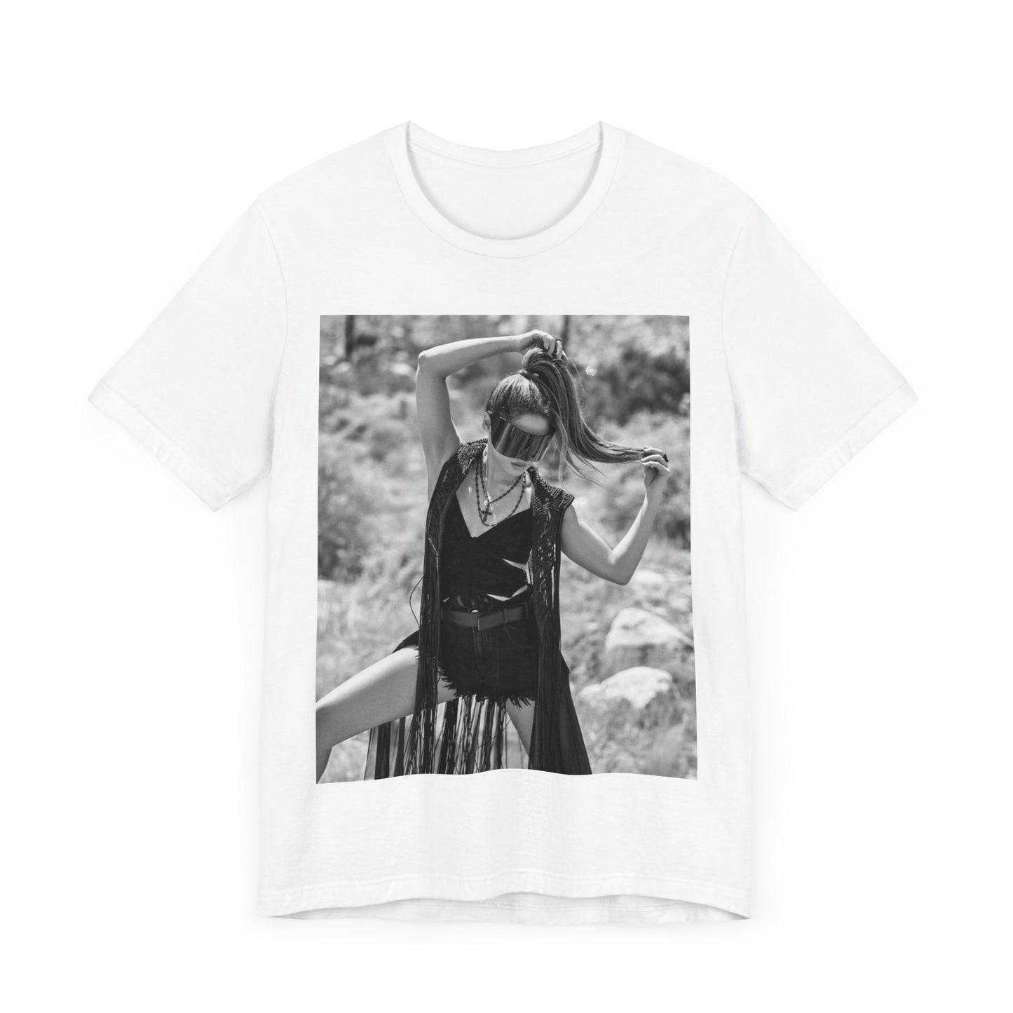 A black graphic t-shirt featuring a black and white, monochrome graphic or photo of Shakira.