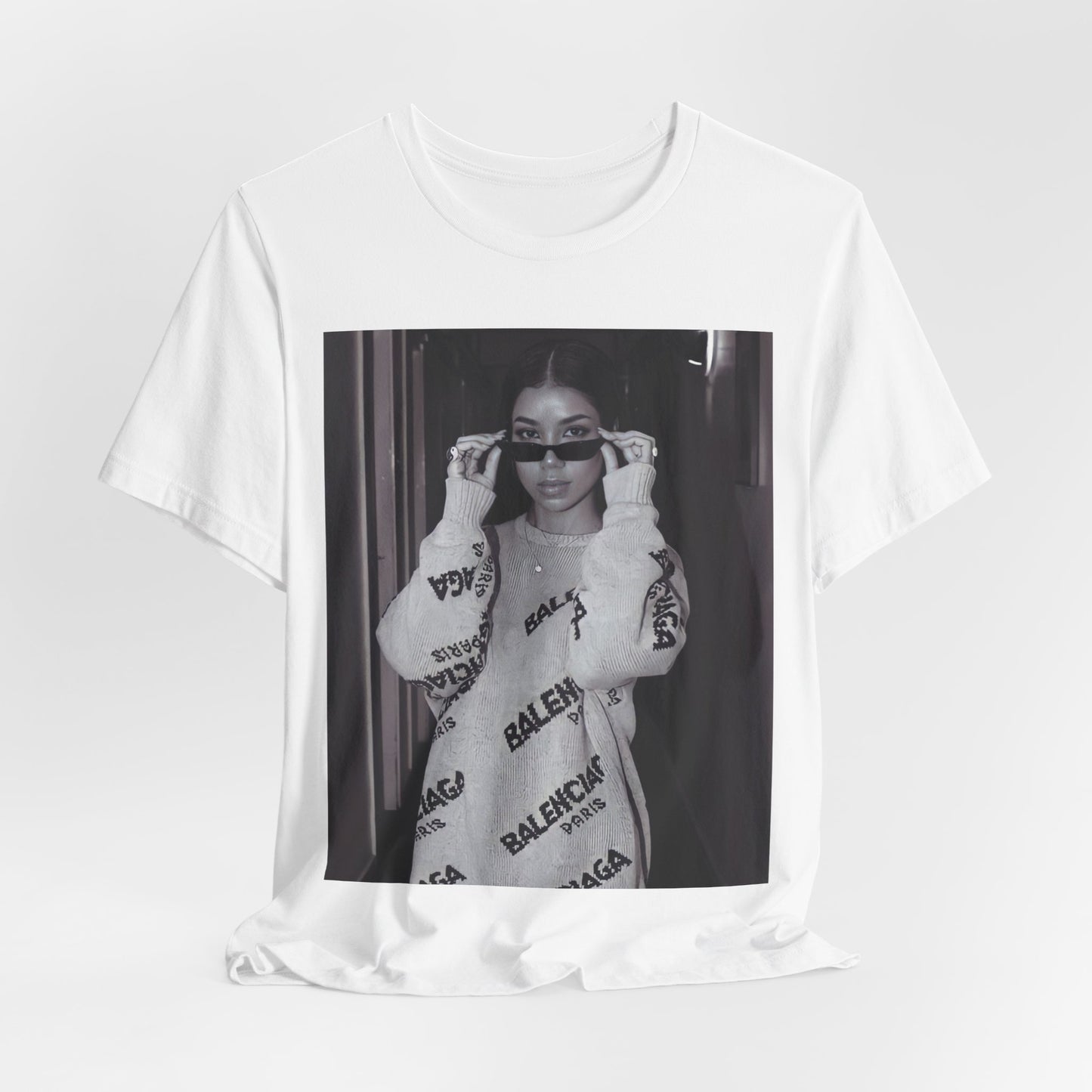 A black graphic t-shirt featuring a black and white, monochrome graphic or photo of Jhene Aiko.