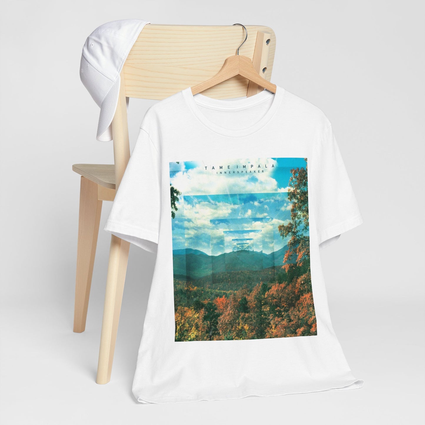 A black graphic t-shirt featuring a graphic related to Tame Impala's 'InnerSpeaker' album.