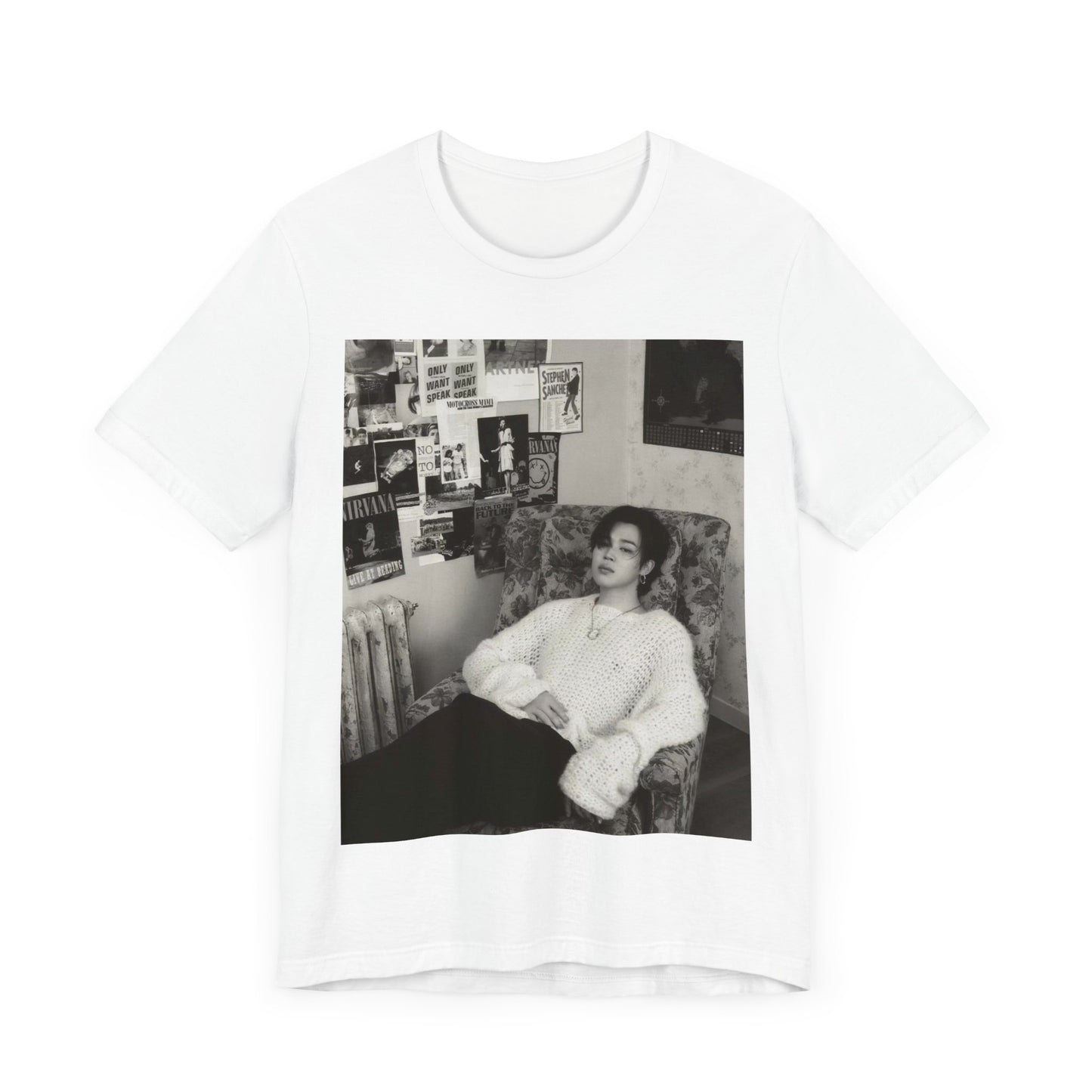 A black graphic t-shirt featuring a black and white portrait photo of Jimin.