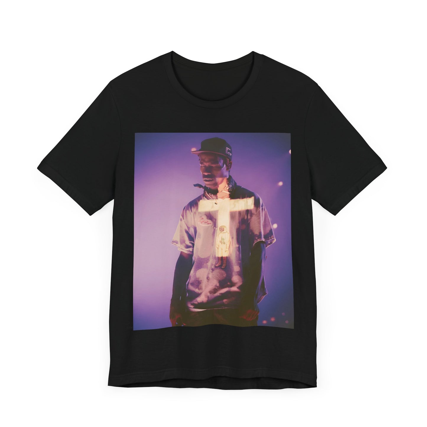 A black graphic t-shirt featuring a graphic of Travis Scott with dark fantasy vibes.
