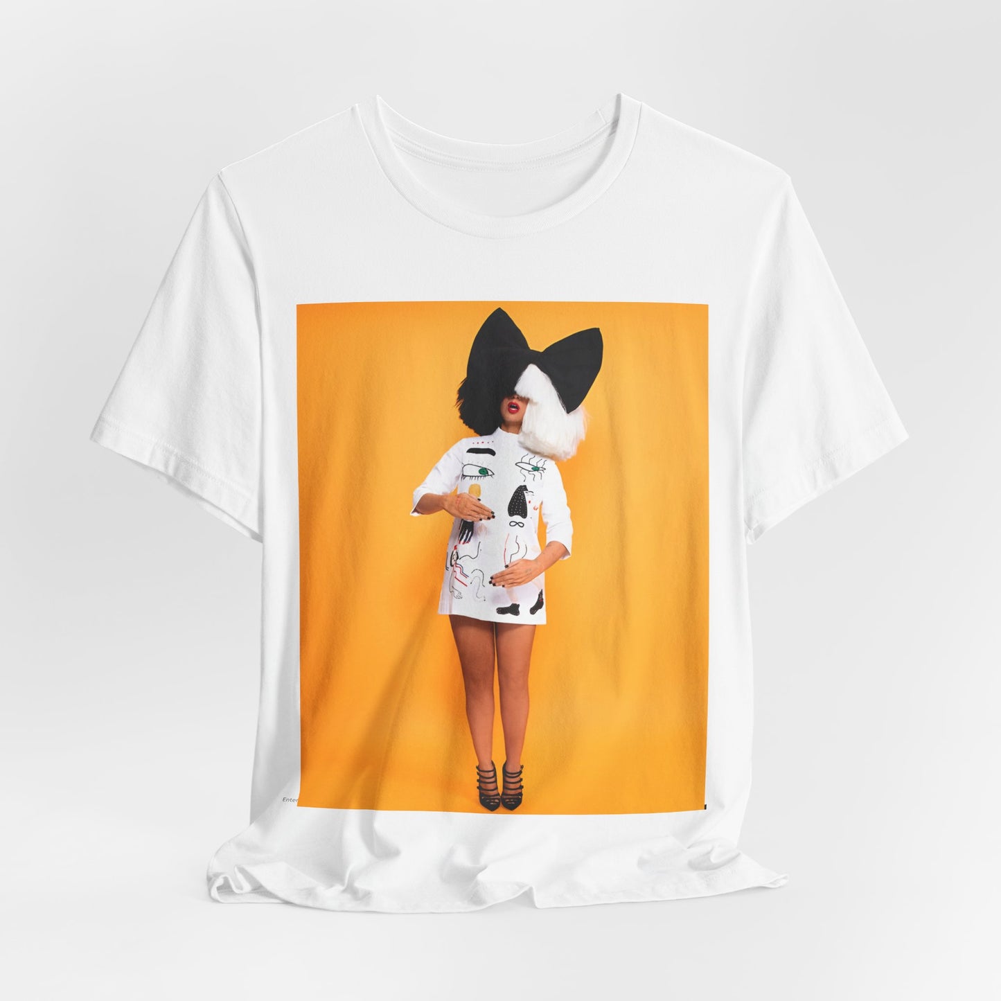 A black graphic t-shirt featuring a graphic of Sia as an art pop visionary.
