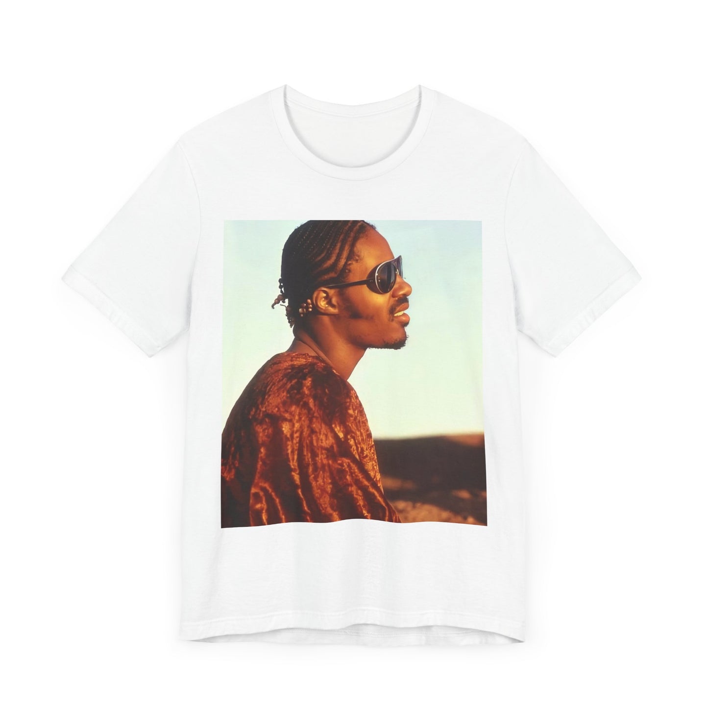 A black graphic t-shirt featuring a graphic of Stevie Wonder as an iconic style pop innovator.