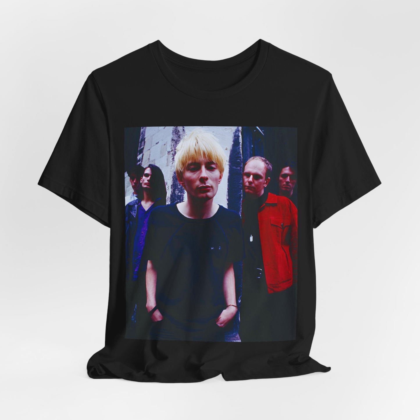 A black graphic t-shirt featuring a graphic of Radiohead as unapologetic art rock icons.