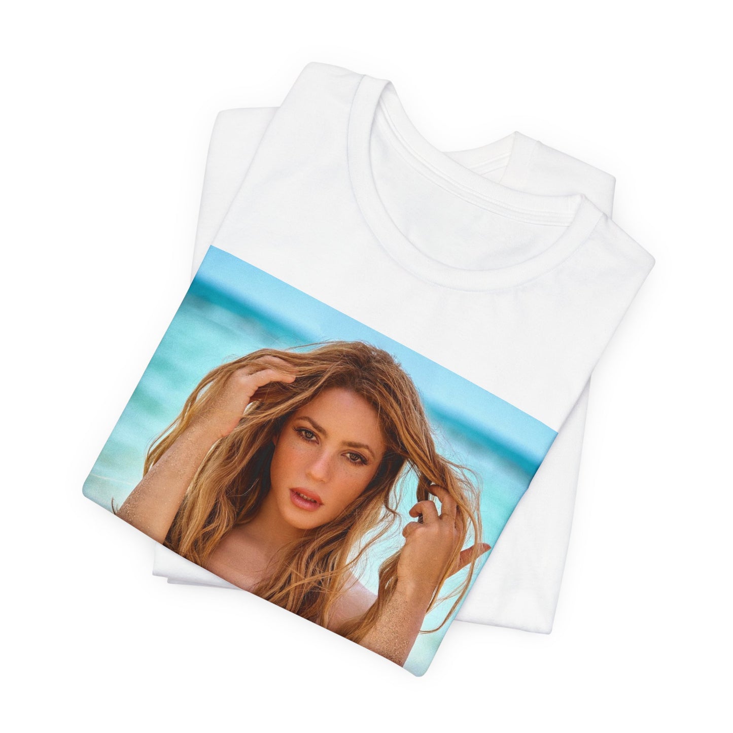 A black graphic t-shirt featuring a graphic of Shakira with a feel-good Latin pop vibe.