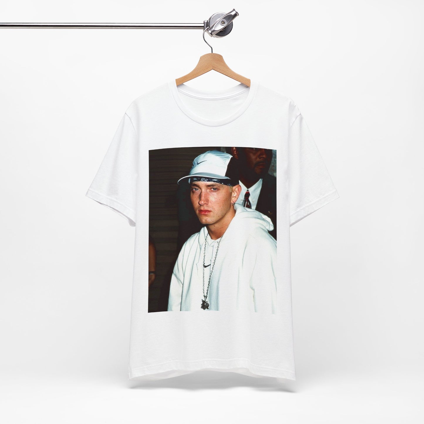 A black graphic t-shirt featuring a retro graphic or photo of Eminem in a backstage setting.