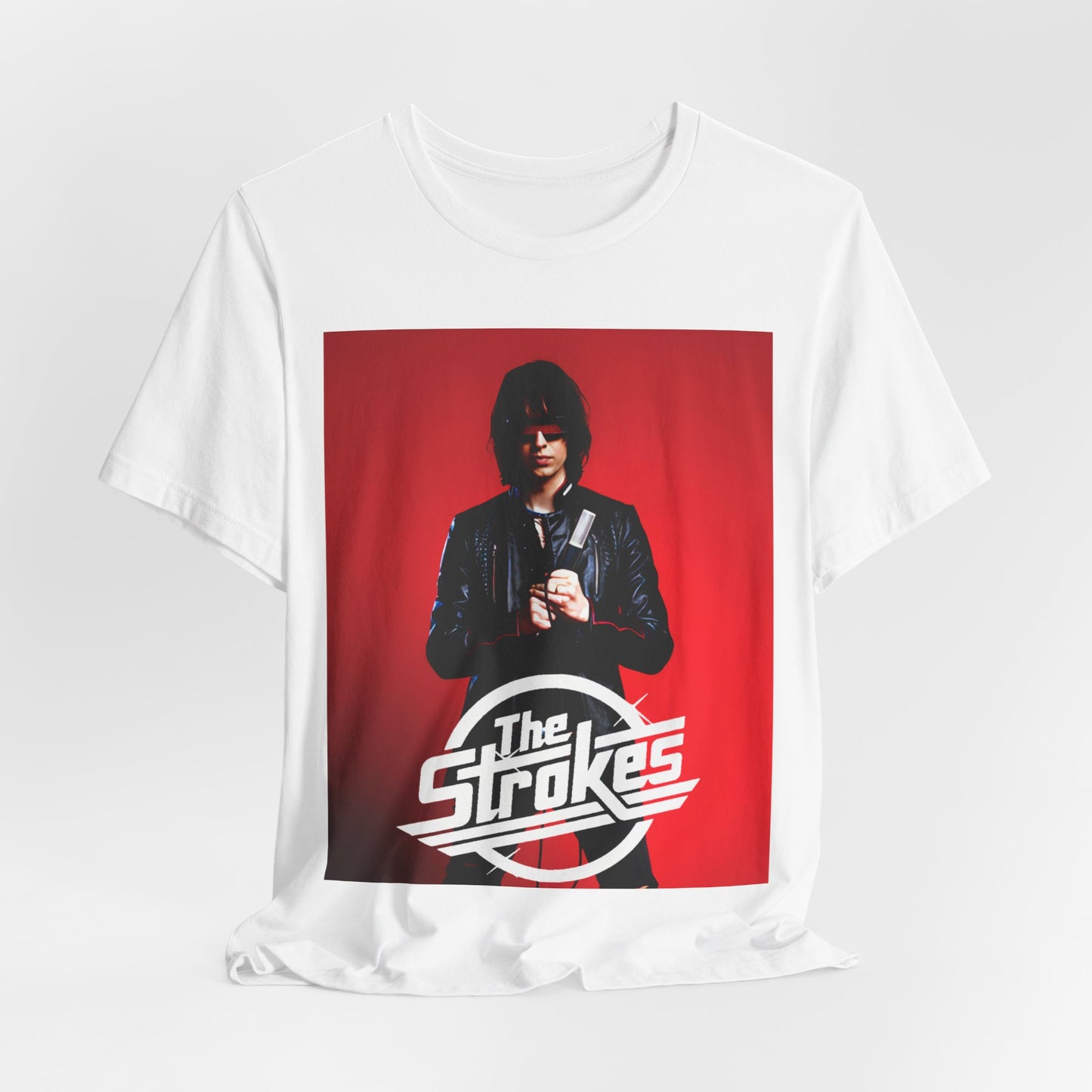 A black graphic t-shirt featuring a bold indie rock superstar graphic of The Strokes.