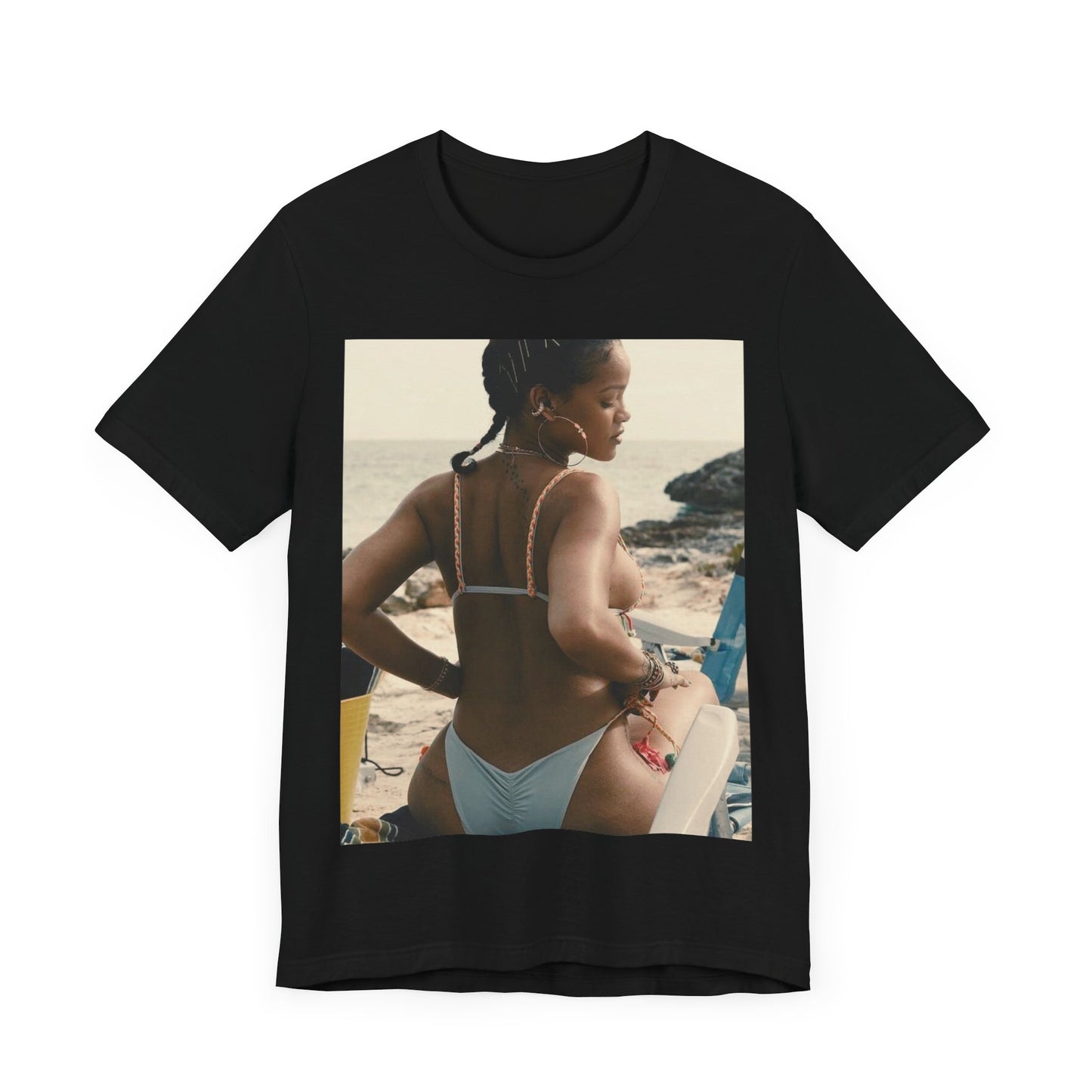 A black graphic t-shirt featuring a graphic of Rihanna as a bikini babe in paradise.