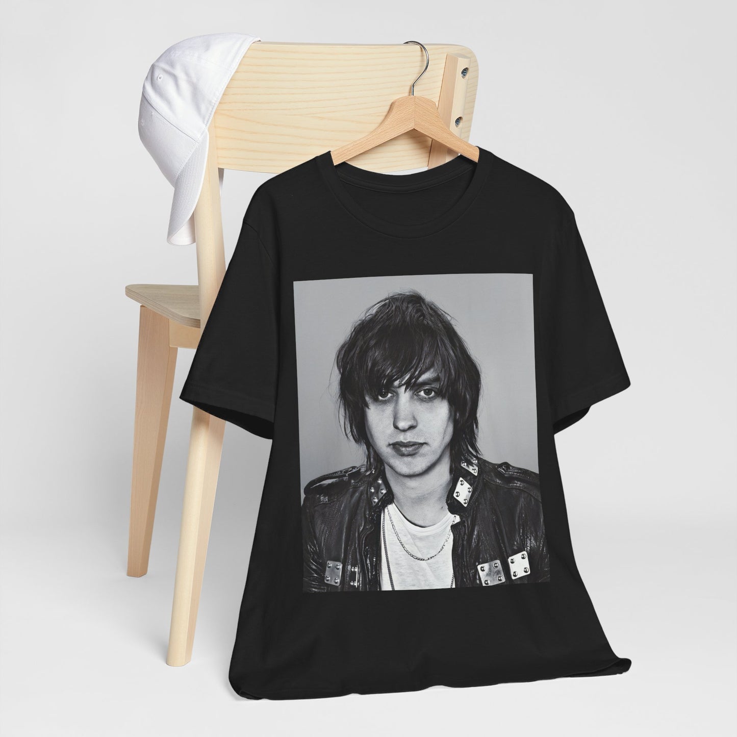 A black graphic t-shirt featuring a portrait photo of Julian Casablancas from The Strokes.